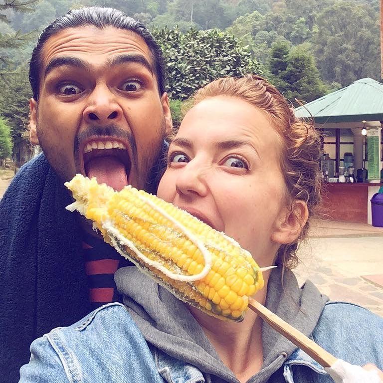 Us in Guatemala enjoying some elote!