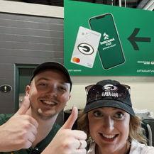 We always took our photo with the Associated Bank billboards at the Packers game to show our support.