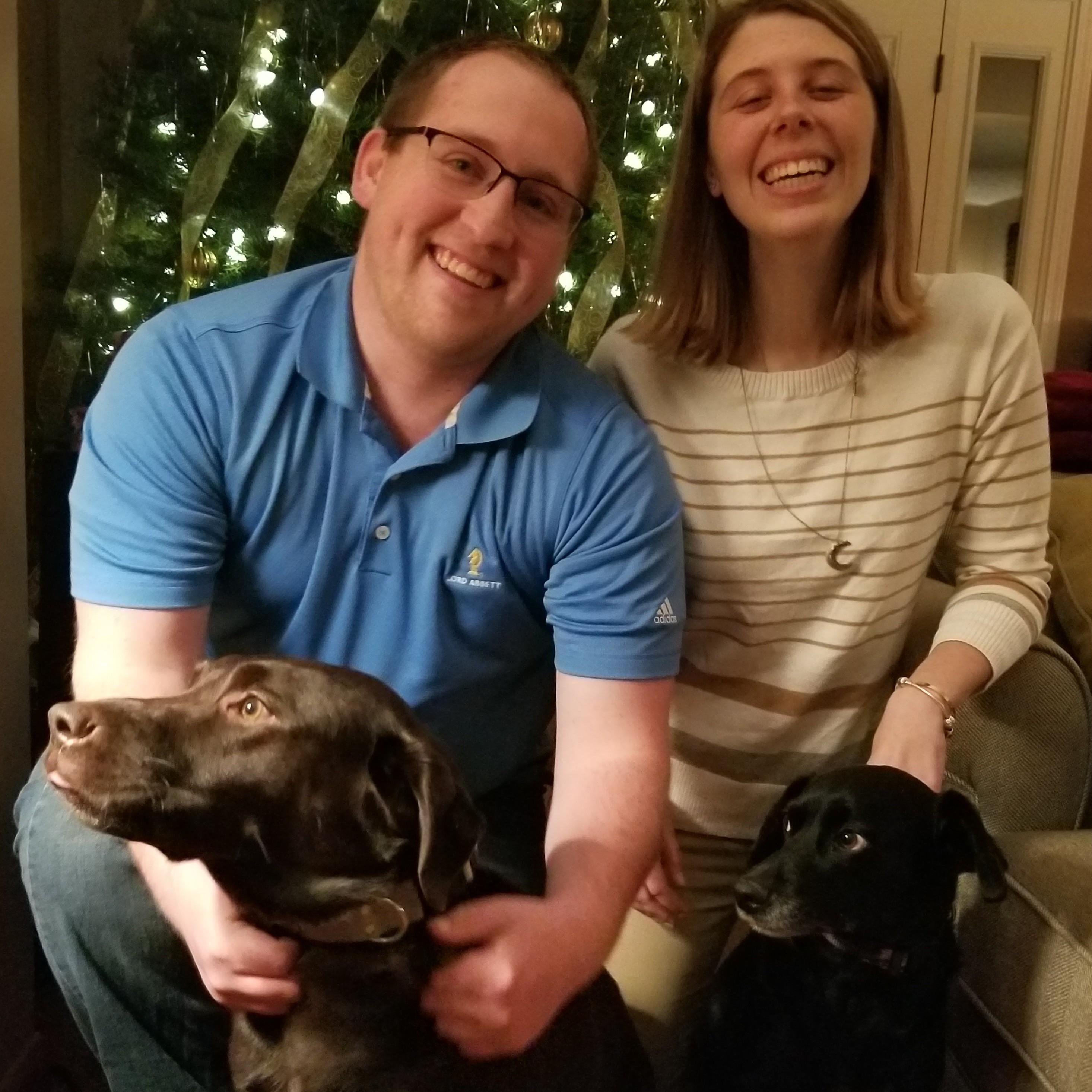 Our very happy family. However, it is impossible to get a picture of all of us because the puppers are very distractible.