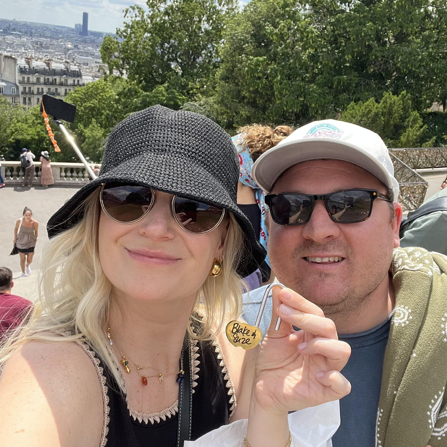 Placing our Love Lock outside Sacre Couer in Paris!