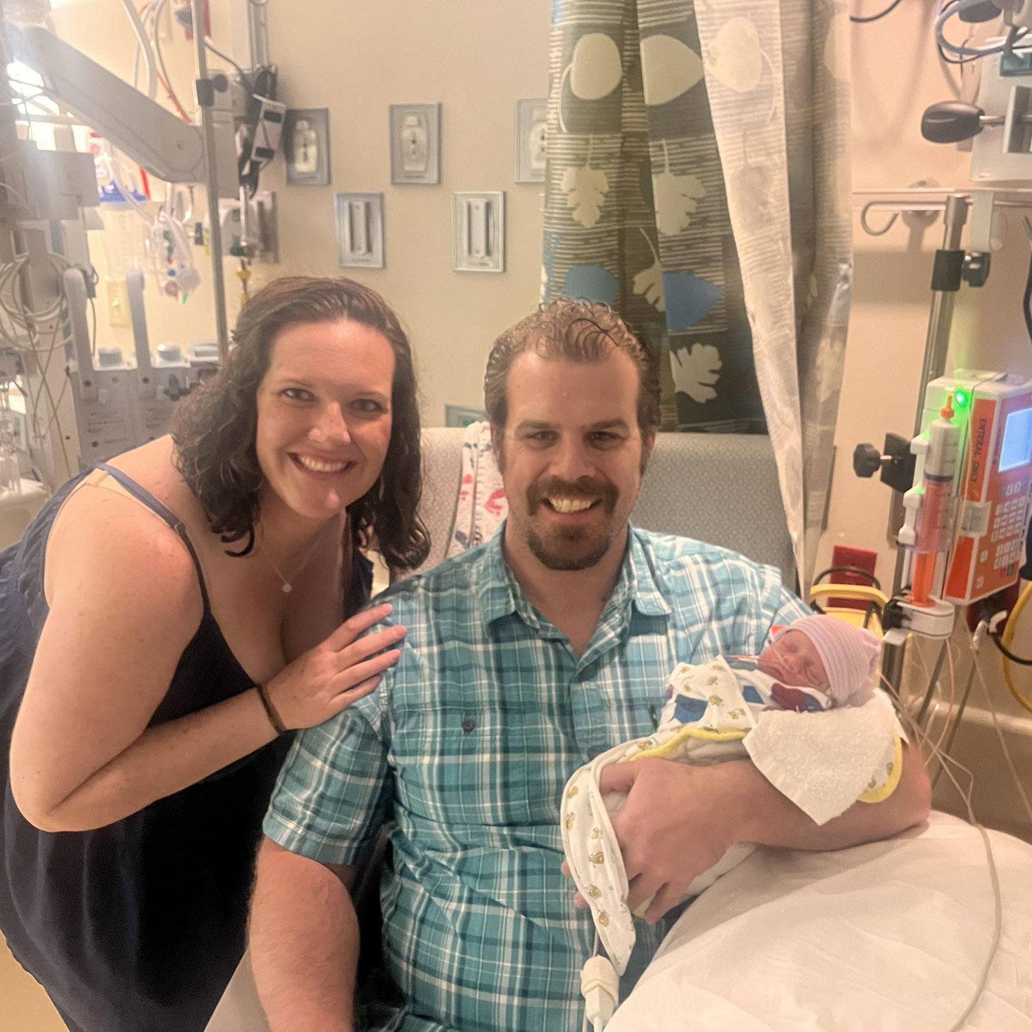 Our first family photo on Easter in the NICU with our baby girl.