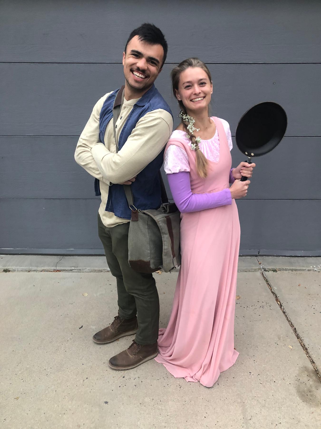 Halloween 2021 dressing up as Flynn Ryder and Rapunzel. Fun fact: Paul brought Tangled to watch on their first date!