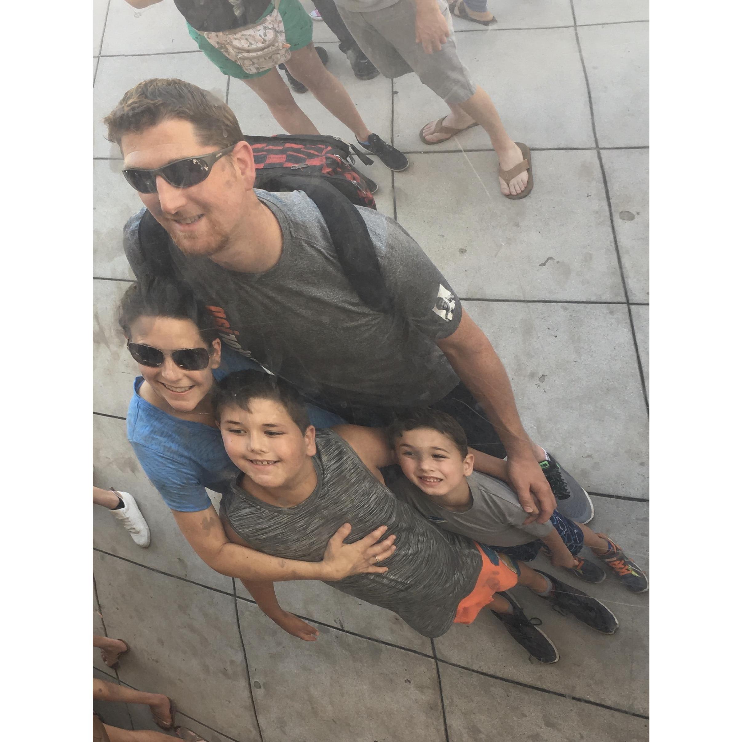 Playing around with our reflection at the Cloud Gate (bean) in Millennium Park, Chicago.