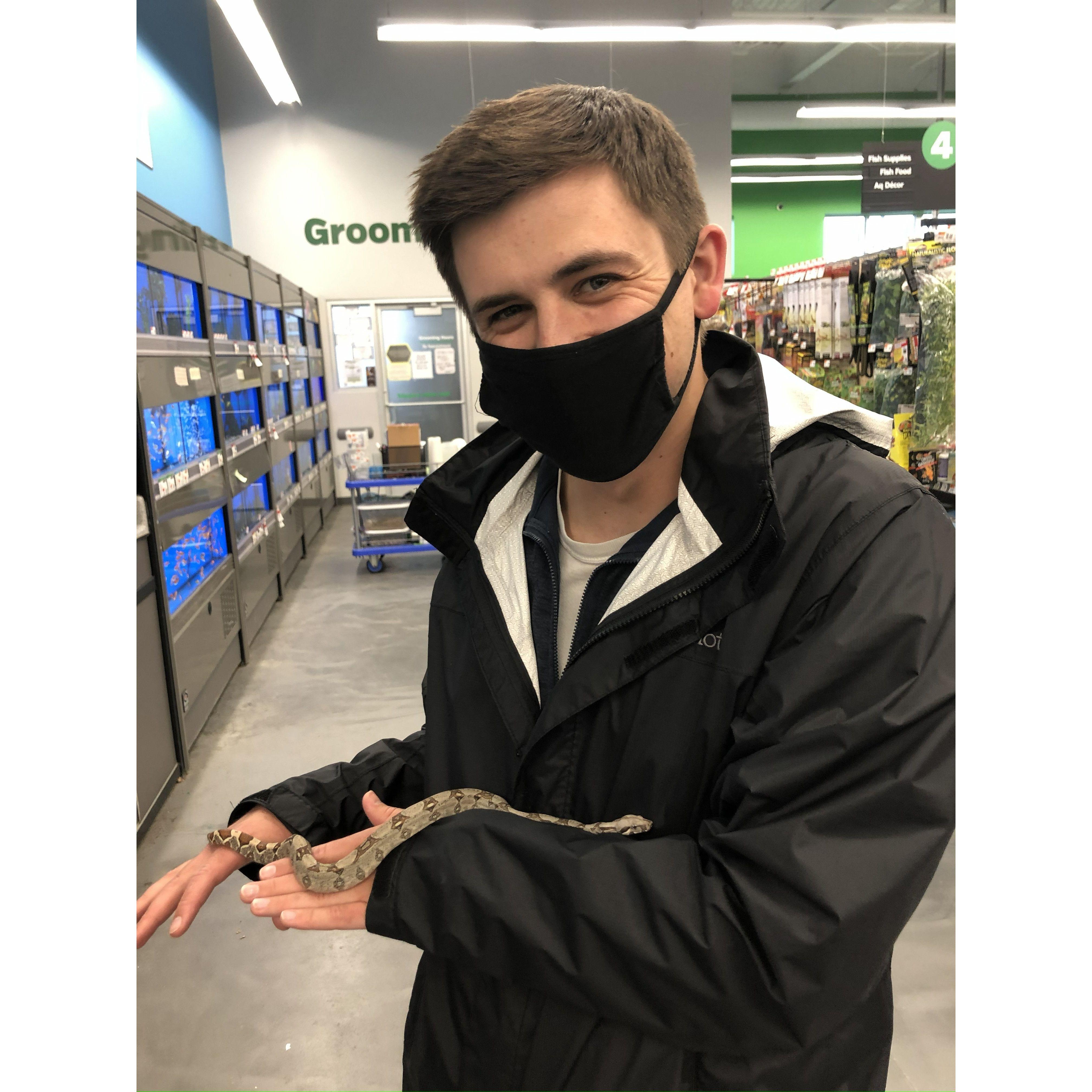 2021 - one of T's many requested visits to the pet store in hopes that she could convince J to bring home new friends. This was not the intended new friend.