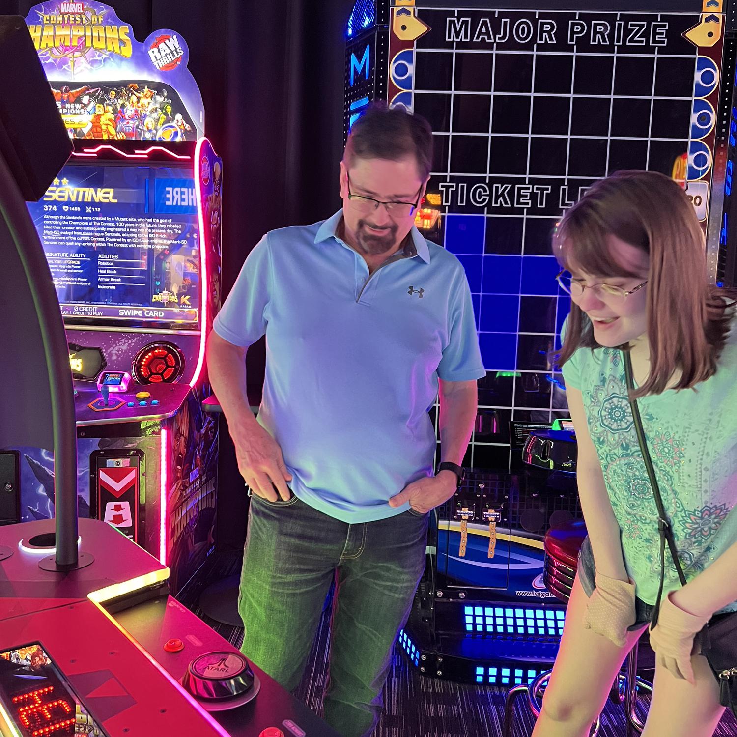 Jon and Katie discussing the game of Pong.