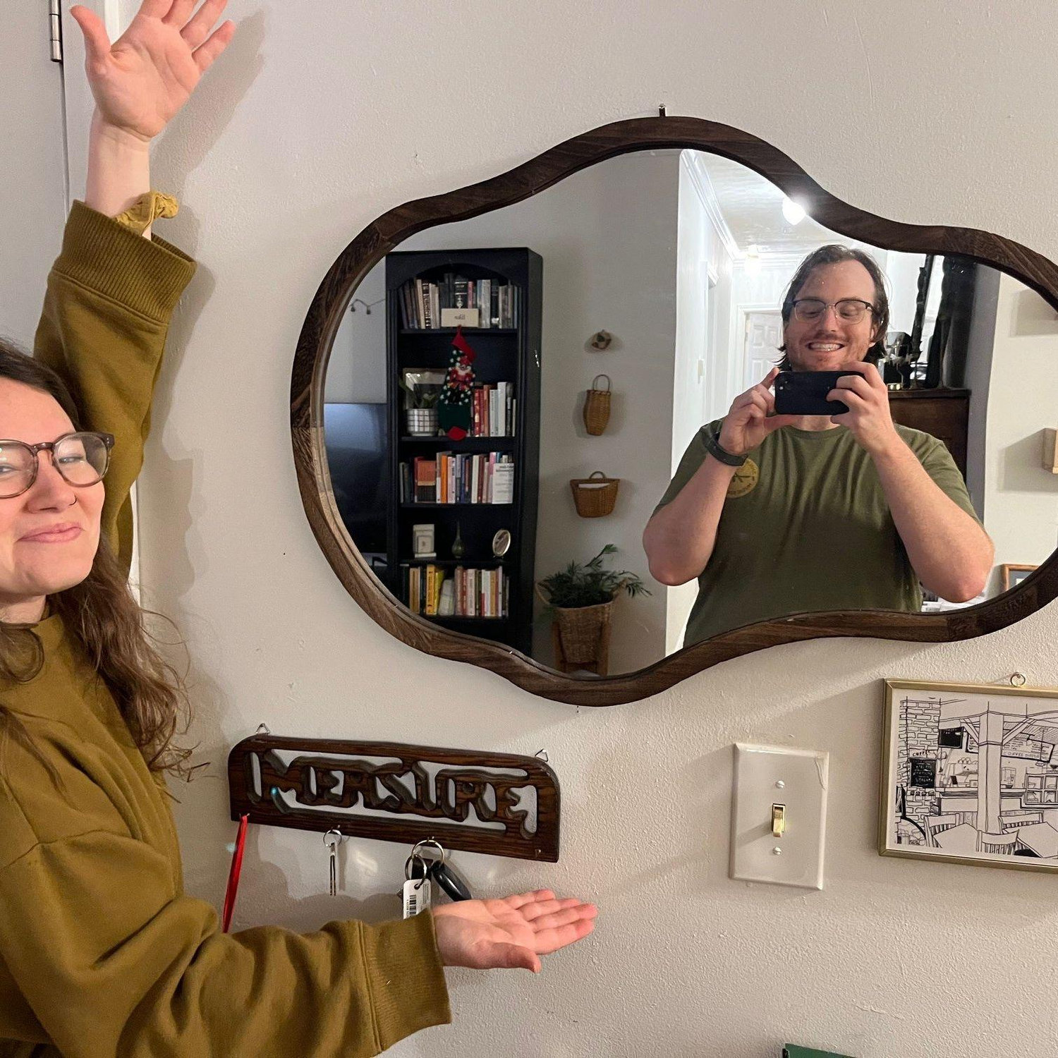 Celebrating some mirror-hanging