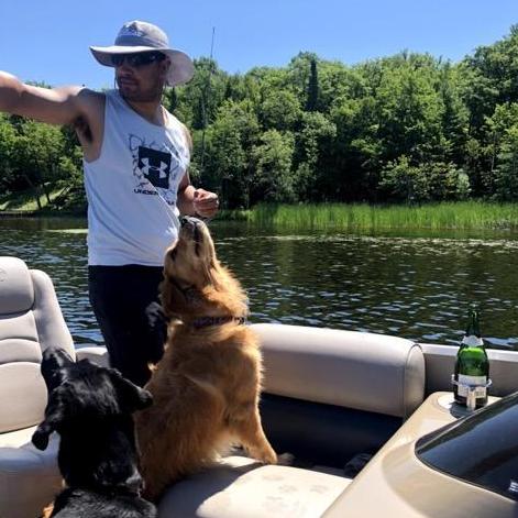 In the summers now, we love spending time at the cabin. The dogs - Boston & Fenway now - love swimming and trying to catch the fish off the dock.