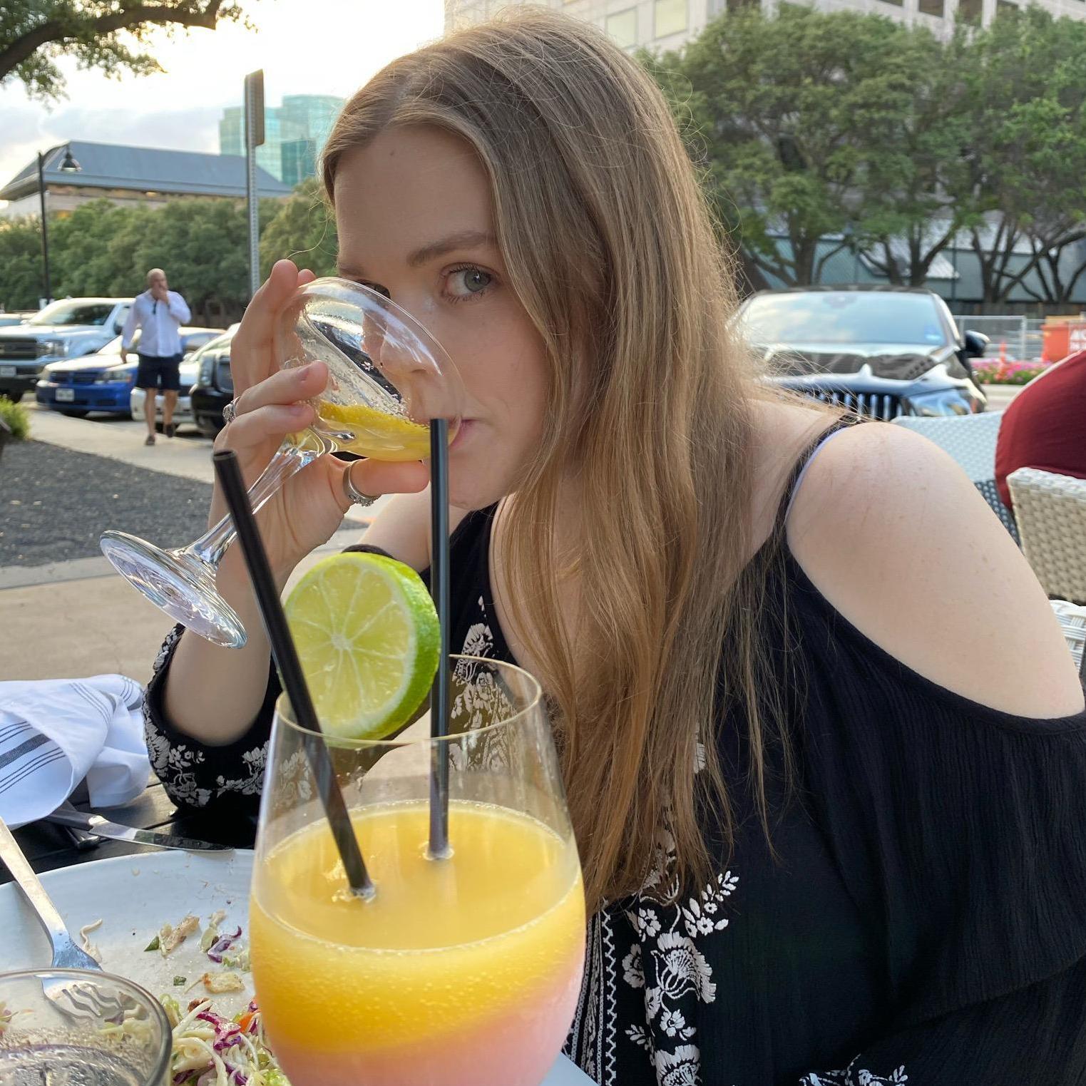 It takes a real man to order that pink and orange fruity drink you see. E is that real man, and we love him for it.