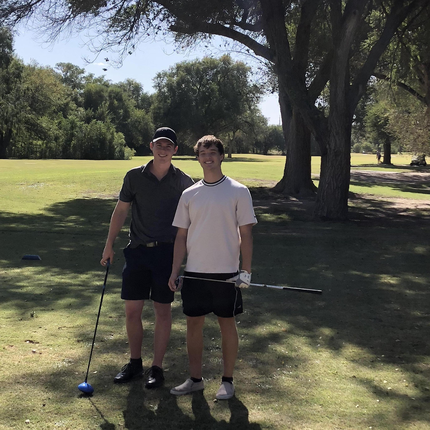 Adam and Chris playing golf!