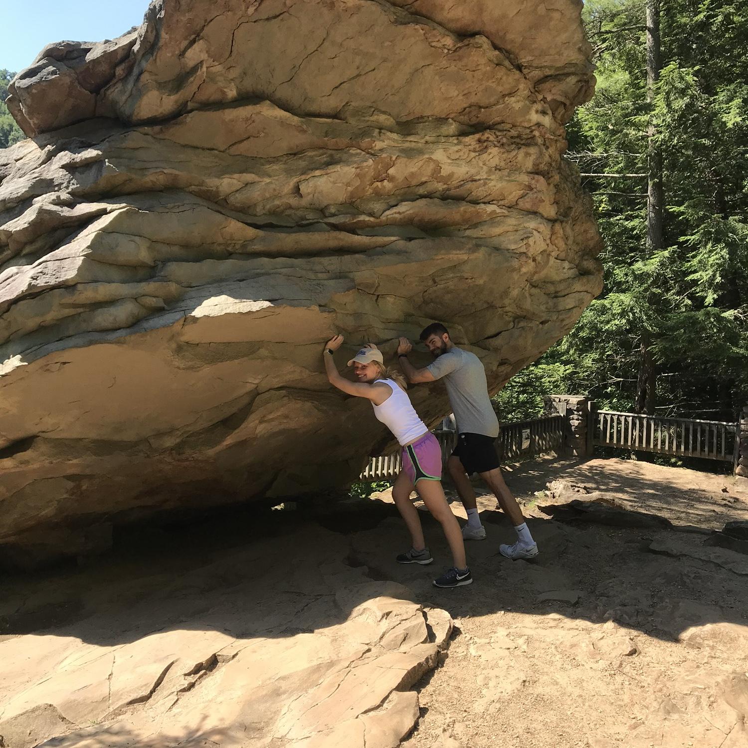 Believe it or not we are holding this rock up...