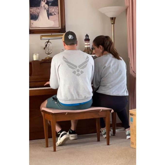 Megan loves sitting and listening to Luke play the piano! This was the first time Luke played for Megan's family