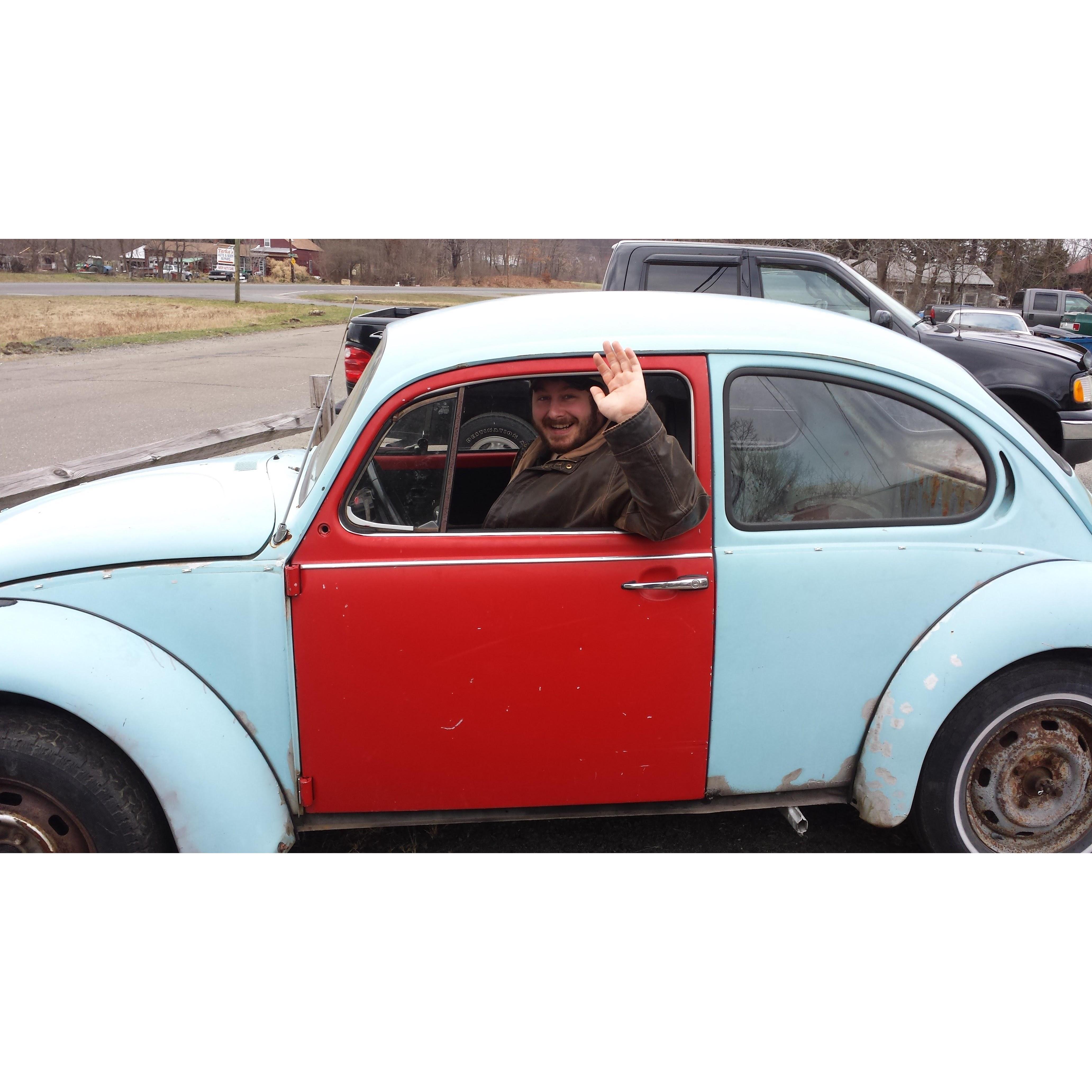 John enjoying that his beetle runs and drives!