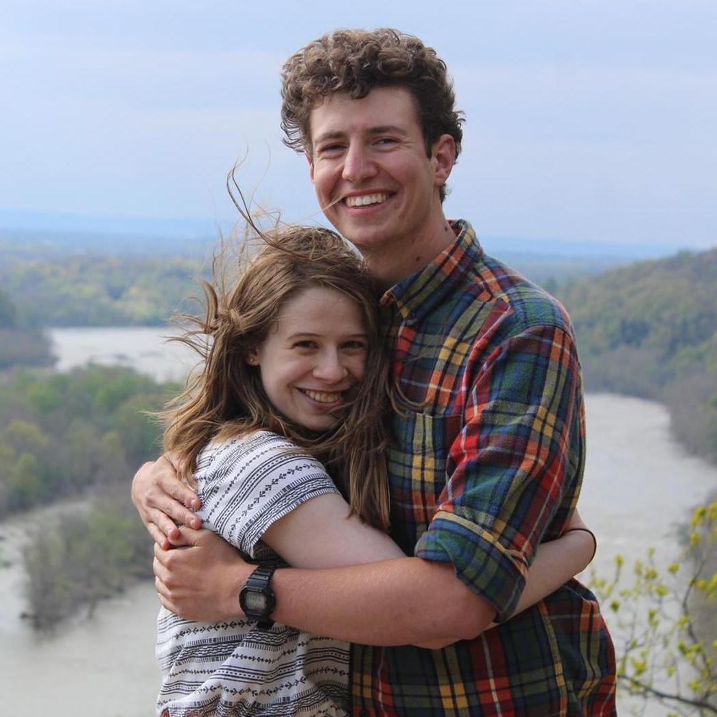 Matanya proposed on a mountain just outside of Harper's Ferry, West Virginia. It was windy.