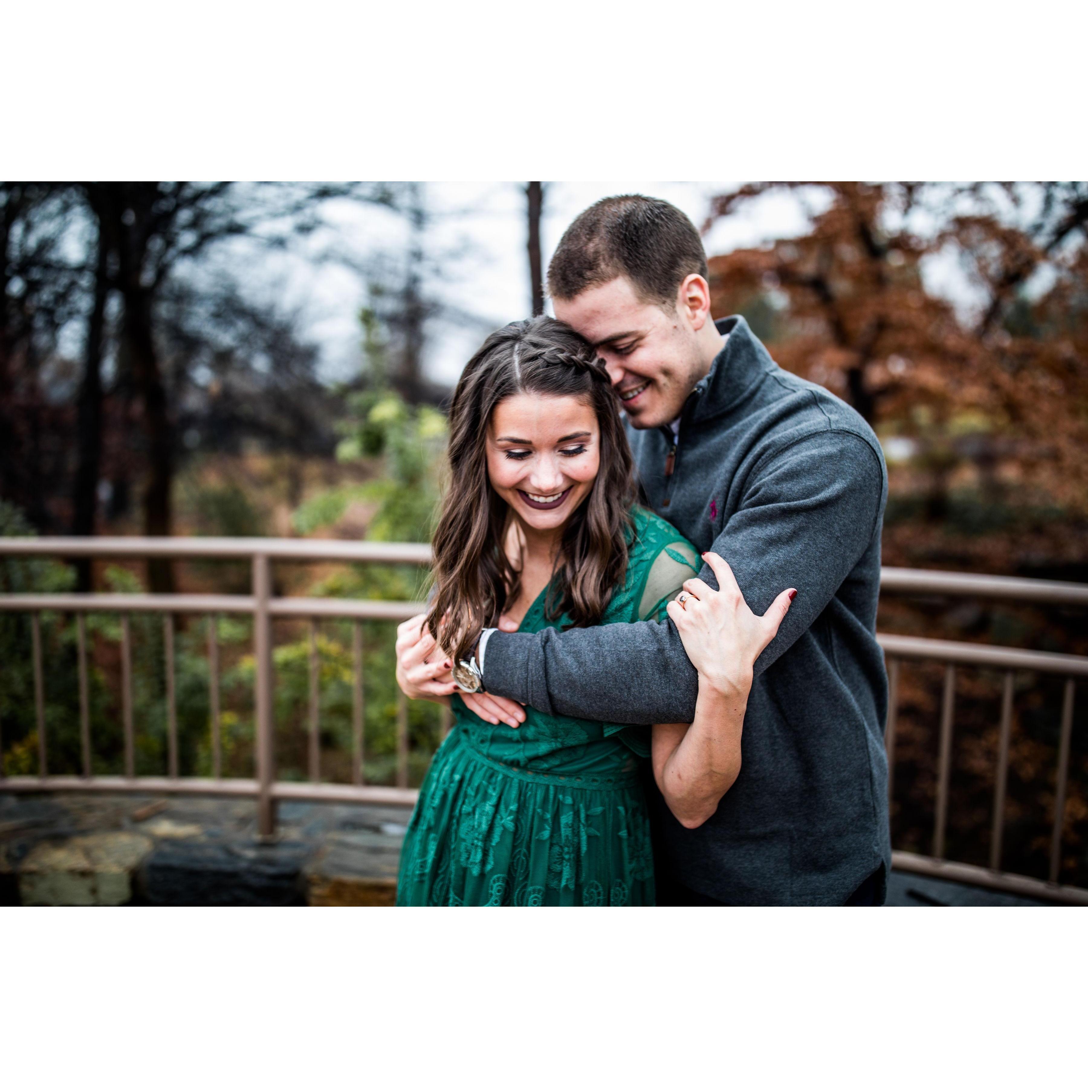Demonstrating improper form of the Heimlich Maneuver.