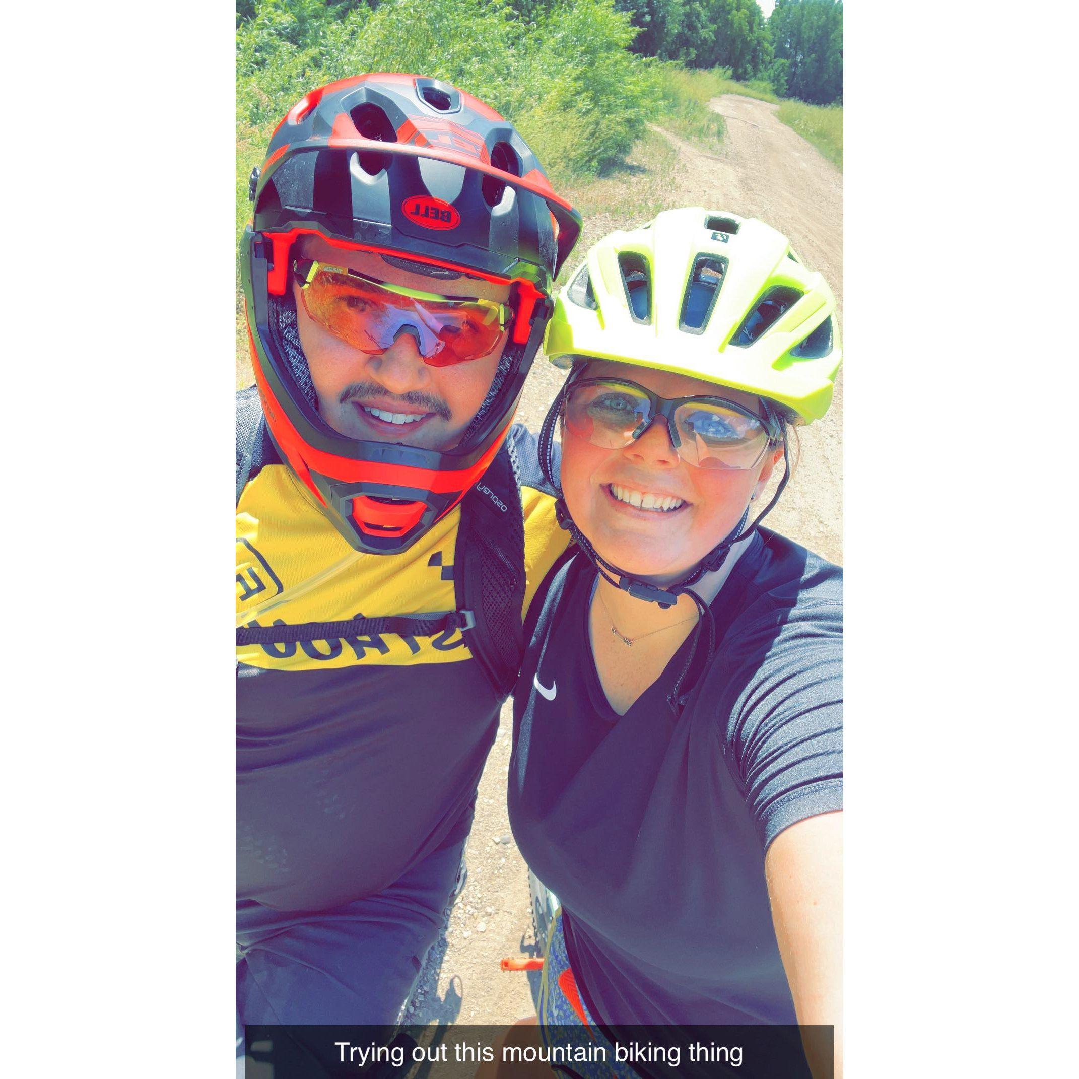 Jordan teaching Kayla how to mountain bike