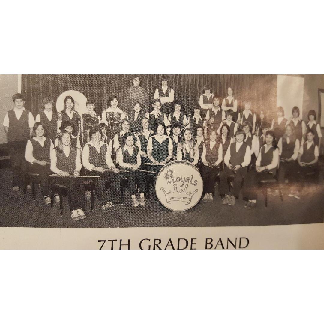 Debra in 7th grade band, far right front row.