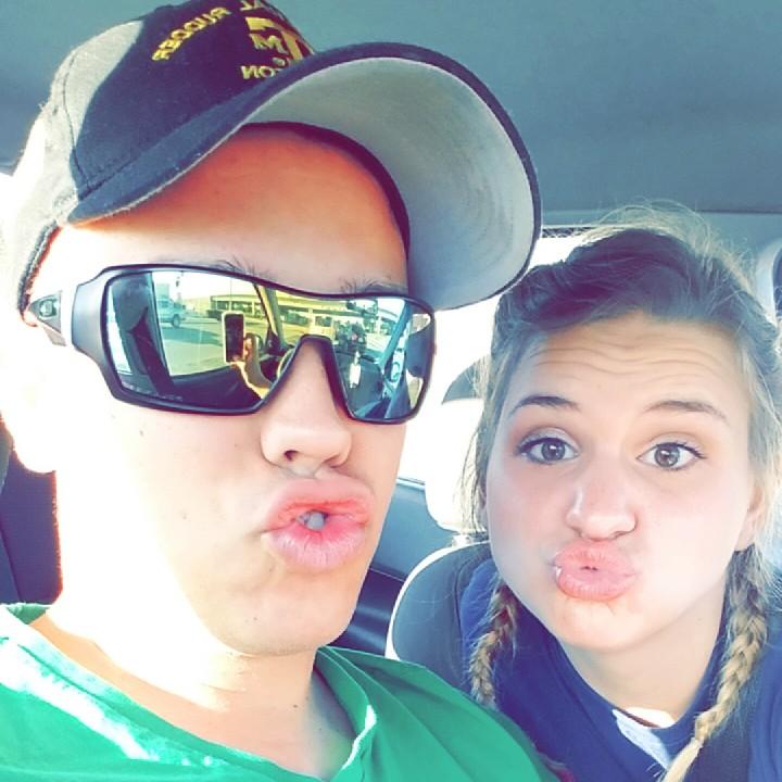 Being silly in the car! The couple road-tripped from Houston, Texas all the way to Fort Myers, Florida! The 2 day trip was quite the adventure.