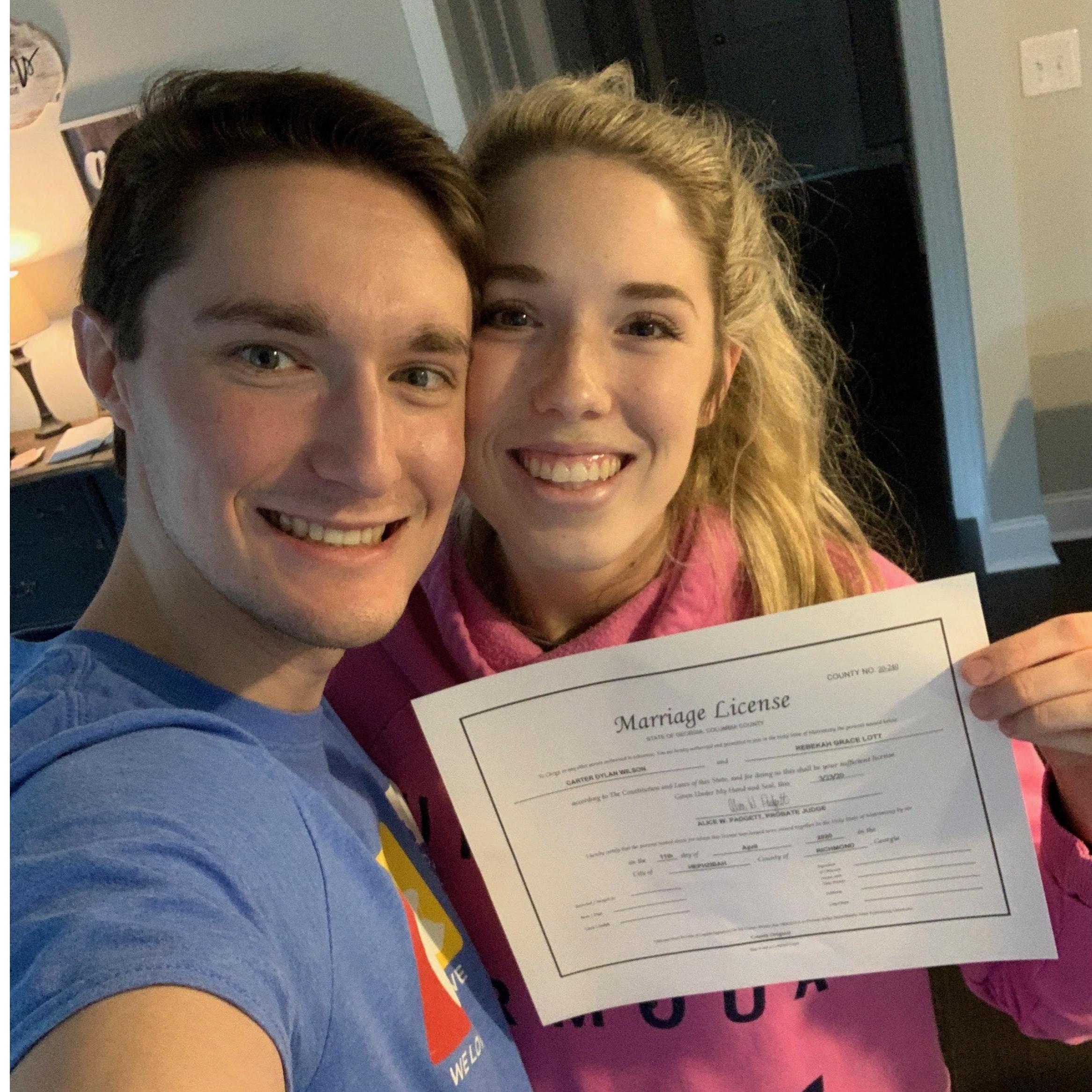 When COVID hit, we knew the courthouses would be closing soon! We snagged our marriage license on the last day possible! Hence my stressed disheveled hair-do... but happy smile!