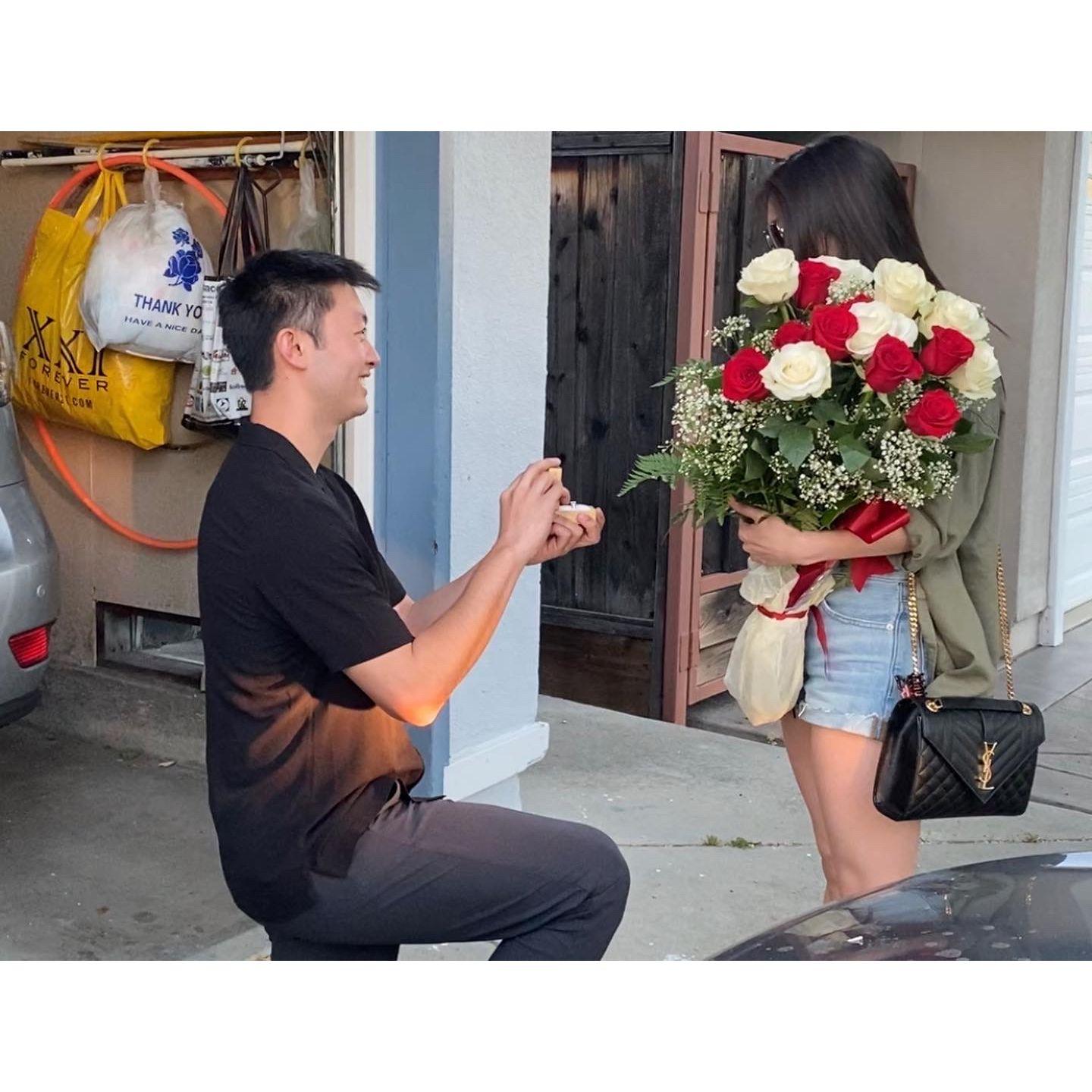 May 2022, San Jose - The proposal!!!! Ruby's face not shown due to massive bouquet of roses (Thank you Ben <3).