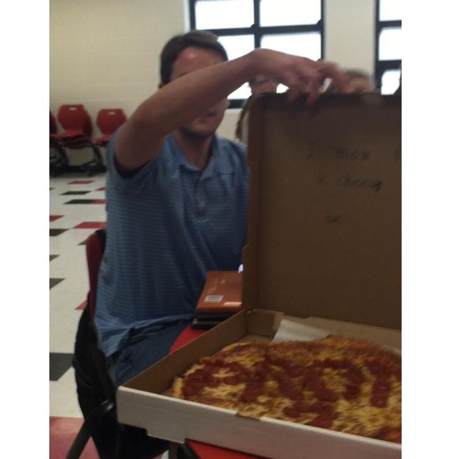 This was the prom-posal our senior year of high school. (photo by bridesmaid Brianna) The lid says, "I know this is cheesy, but..." and the pepperoni spells "PROM?"