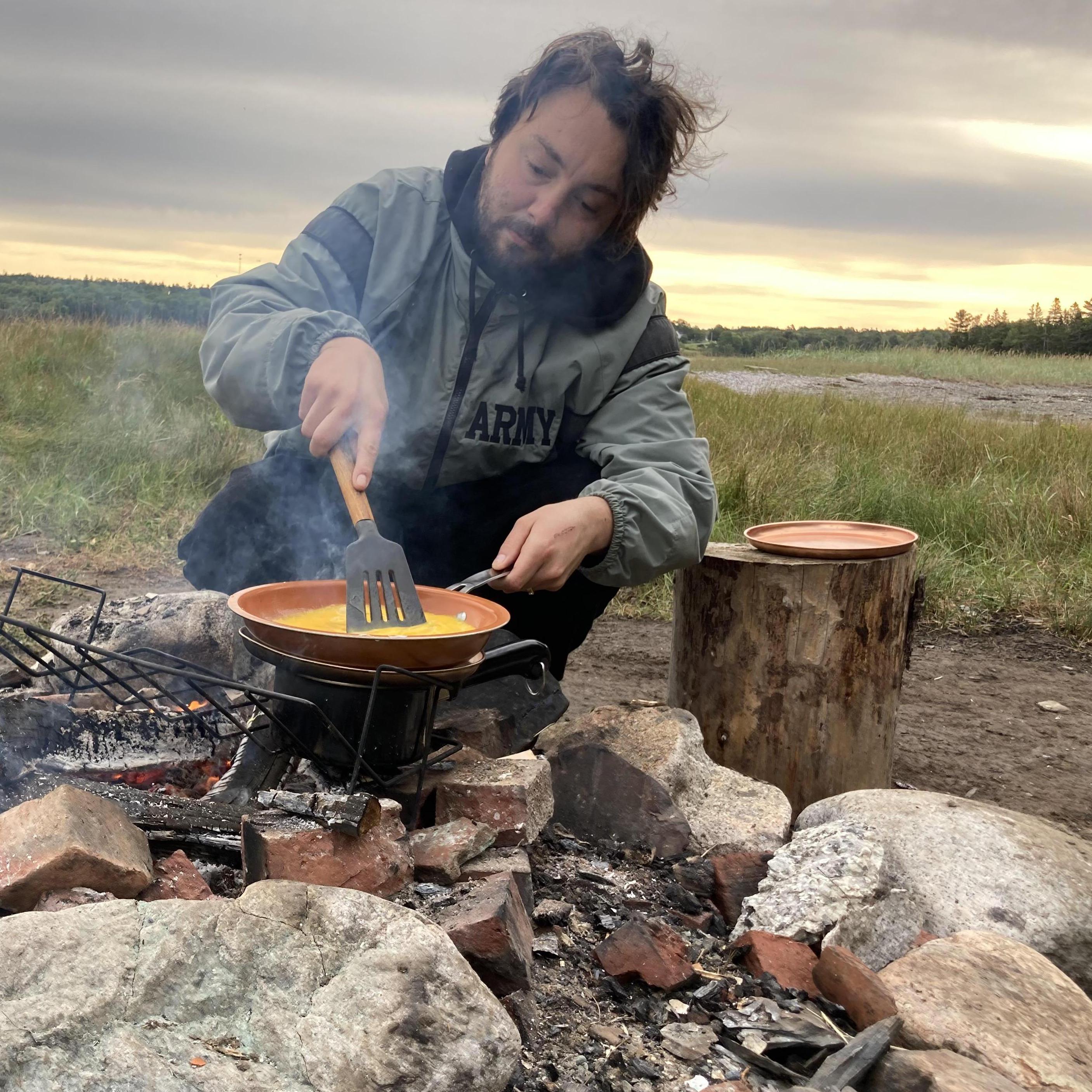 Cooking breakfast on the open fire