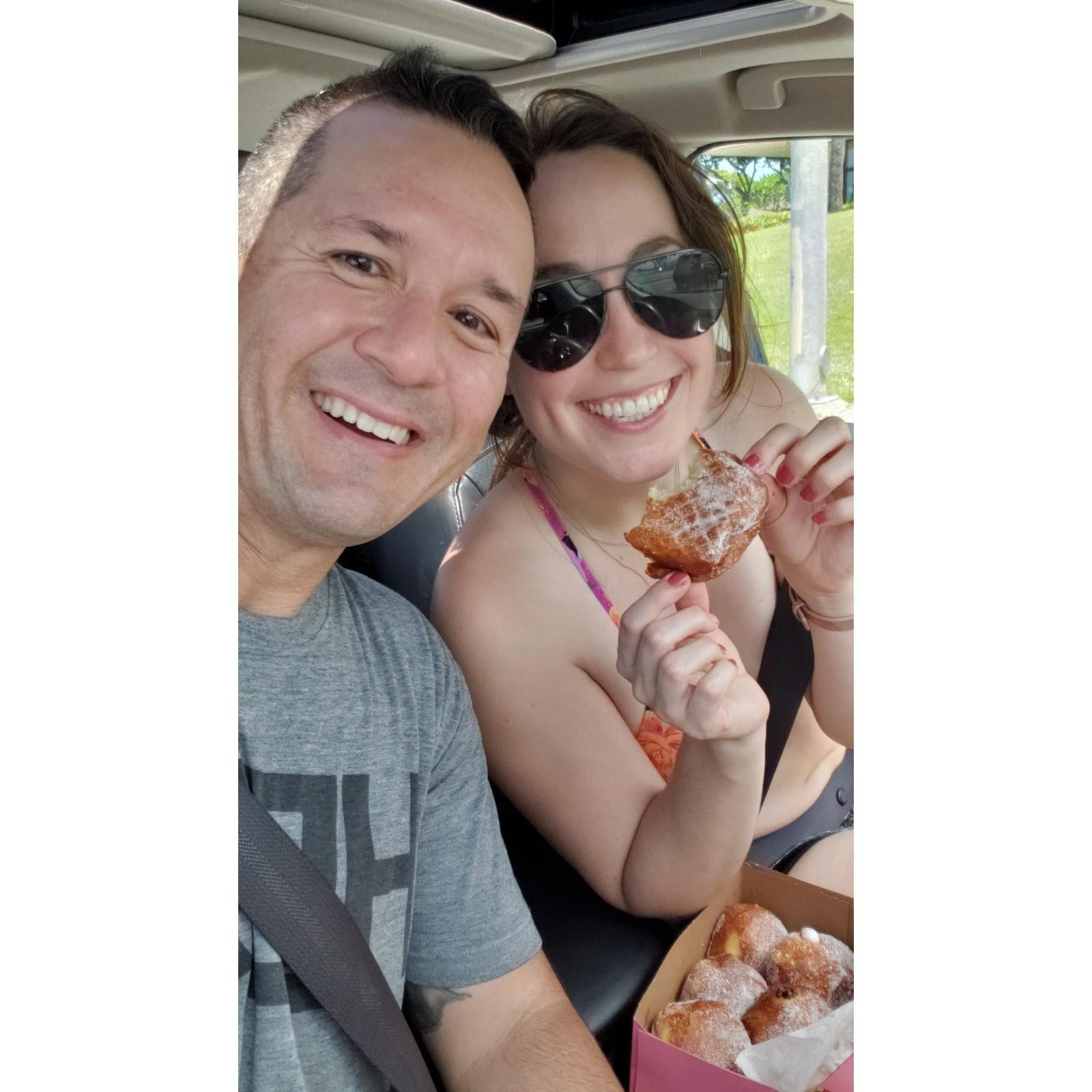 Kelly's first time trying Malasada's on Oahu. We showed up to the party with 2 Malasadas short of a dozen. Kelly's fault!!