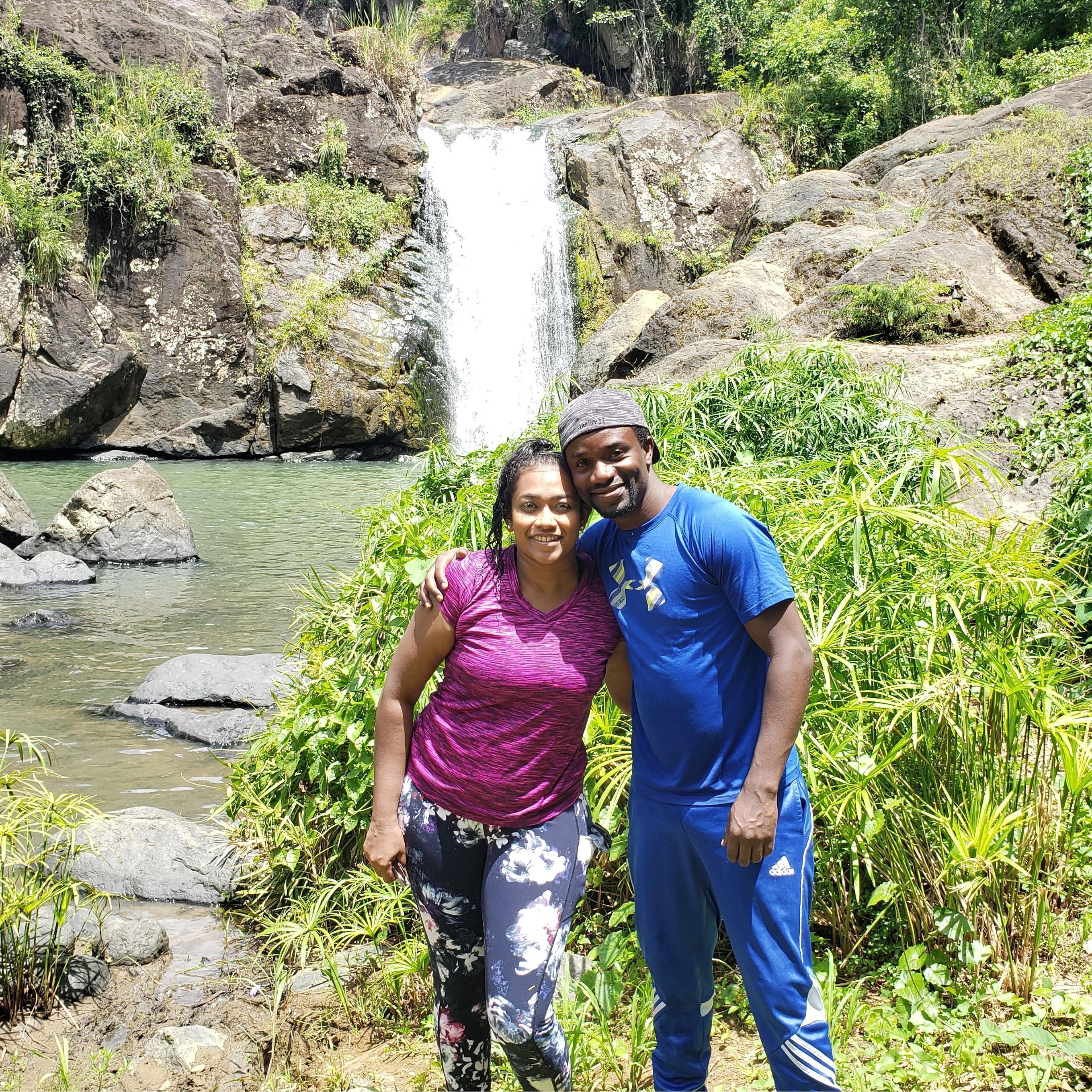 Swimming in a waterfall in the rainforest