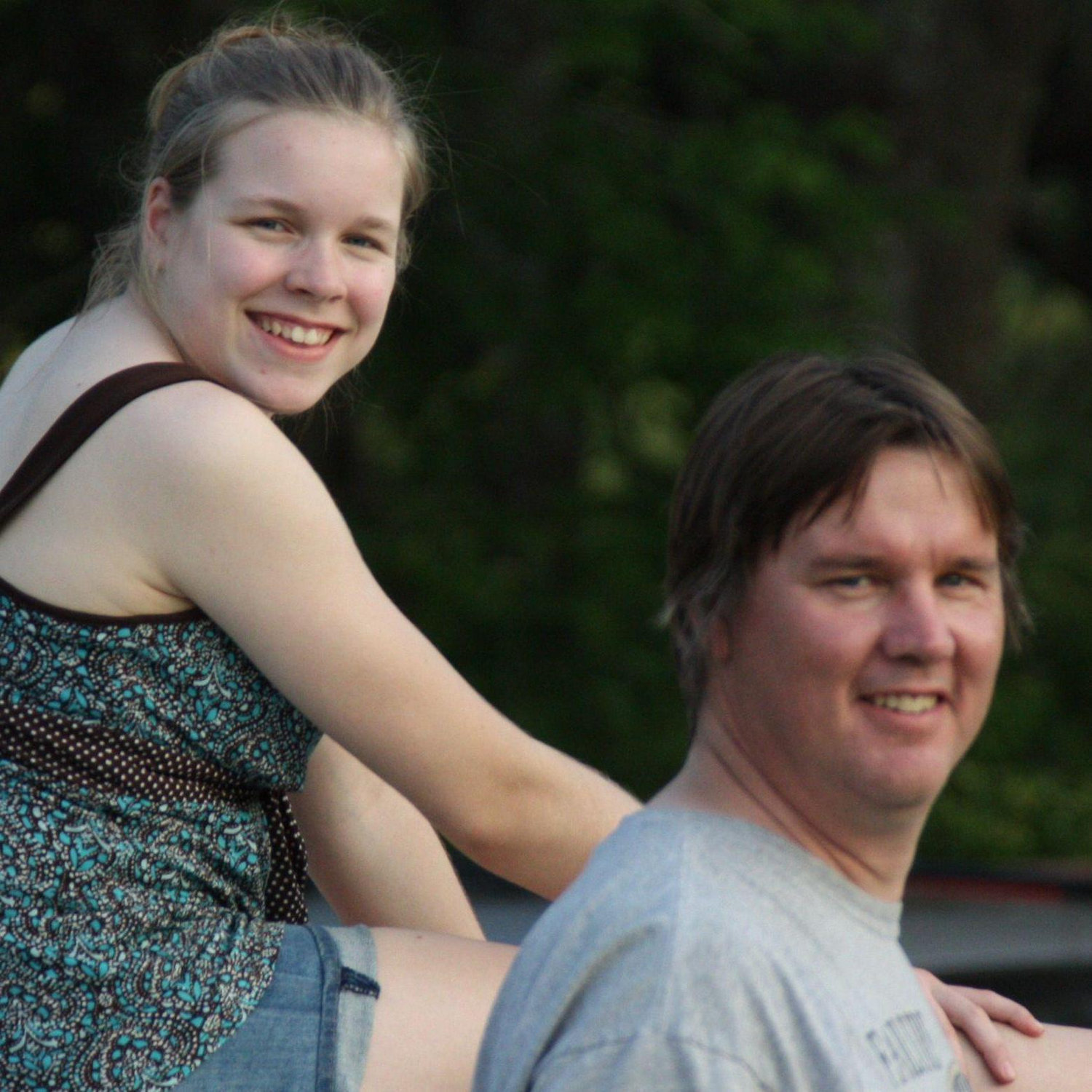 Carol & Kevin watching Jason's baseball game