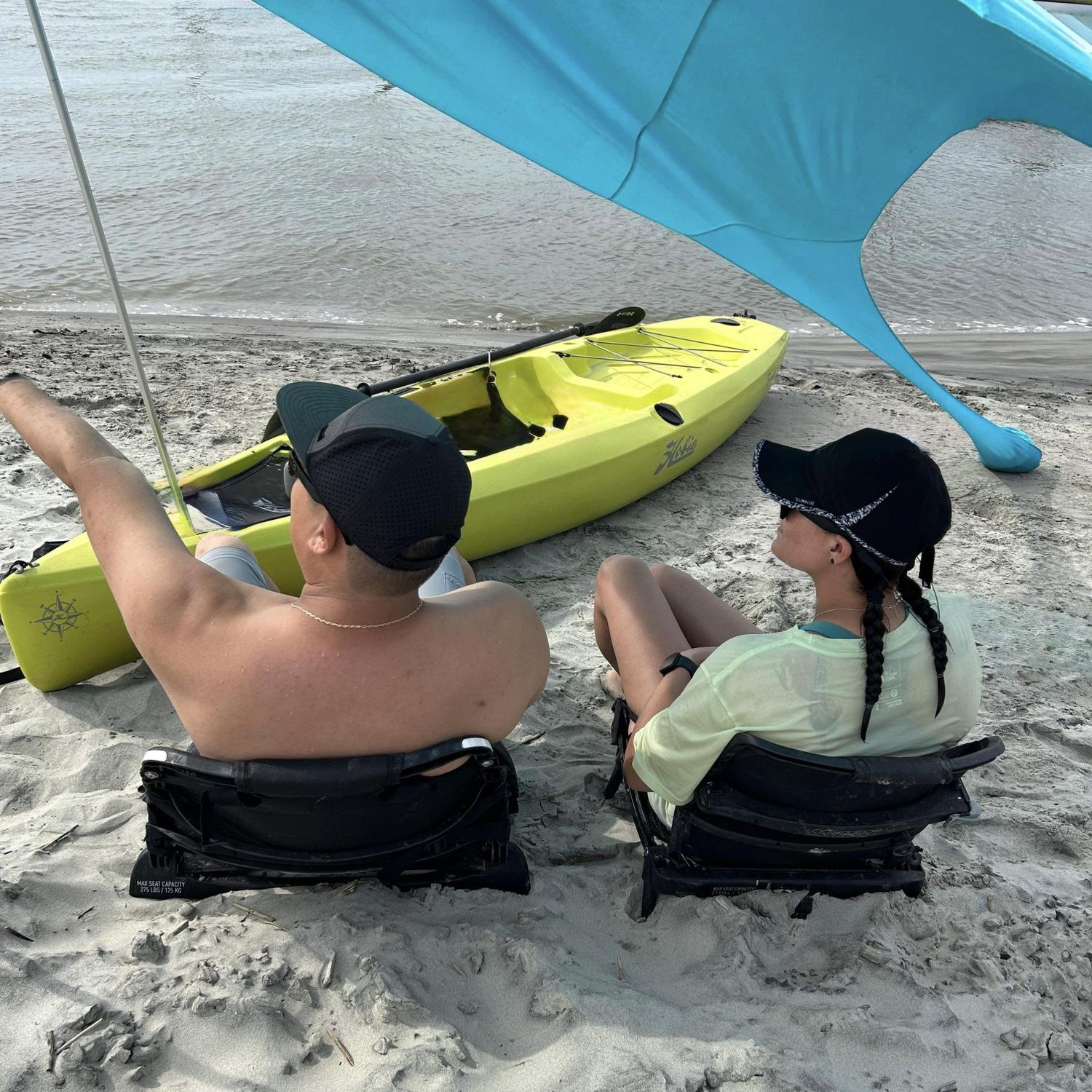 Kayaking to our favorite beach and watching the dolphins swim by.