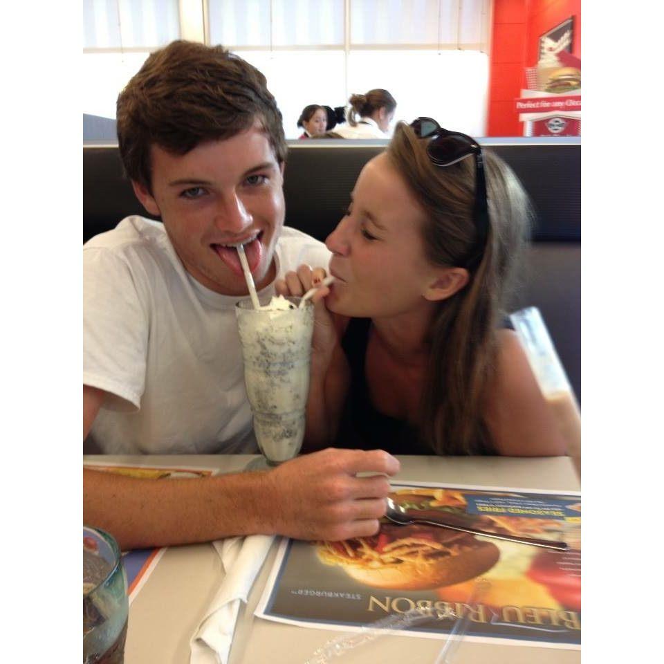 Sharing a milk shake at steak-and-shake in high-school!