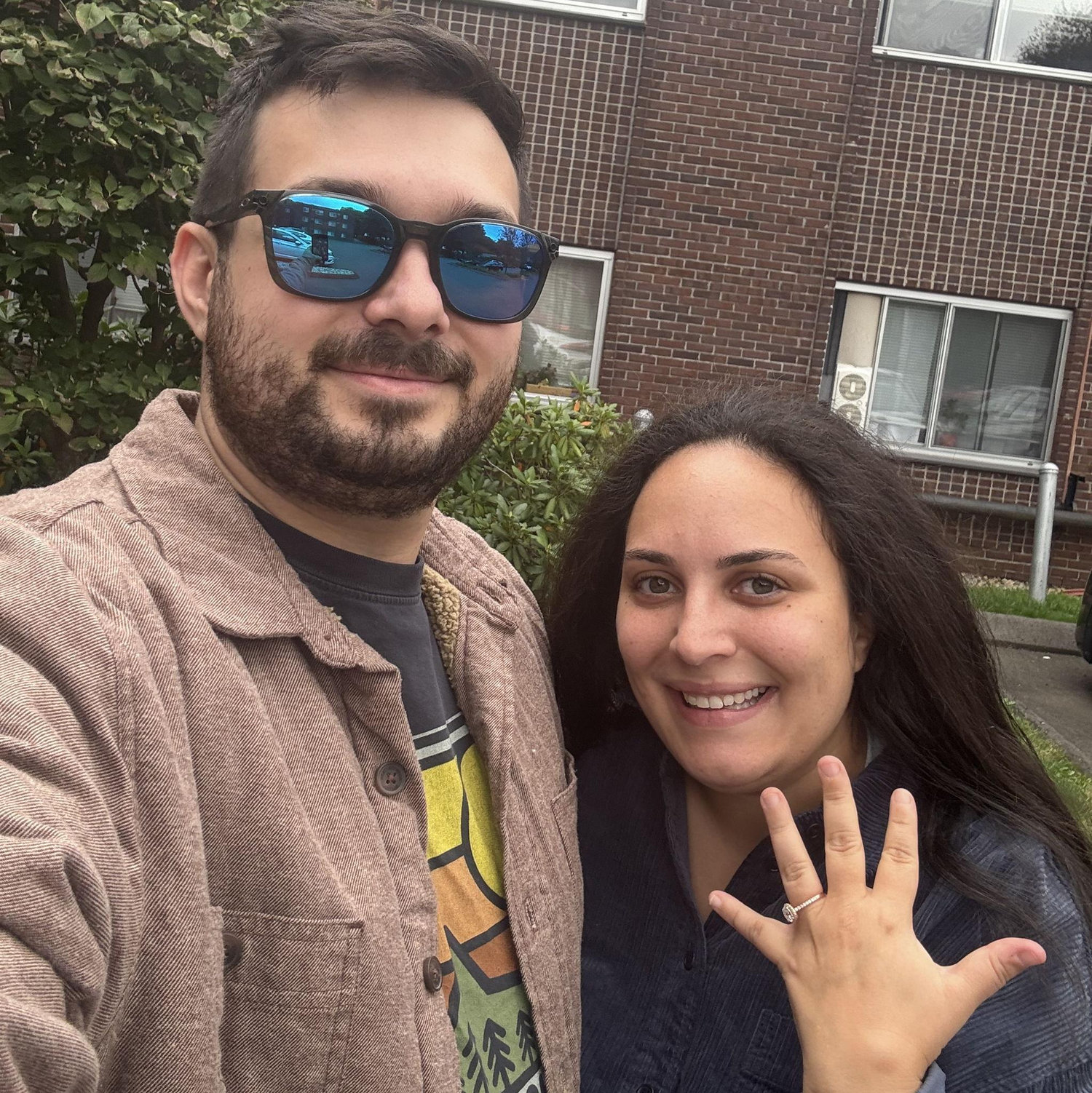 The only picture I have capturing the day we got engaged, outside our apartment. I didn't want any pictures taking during the proposal itself.