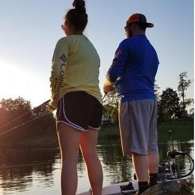 Erik teaching me how to fish!