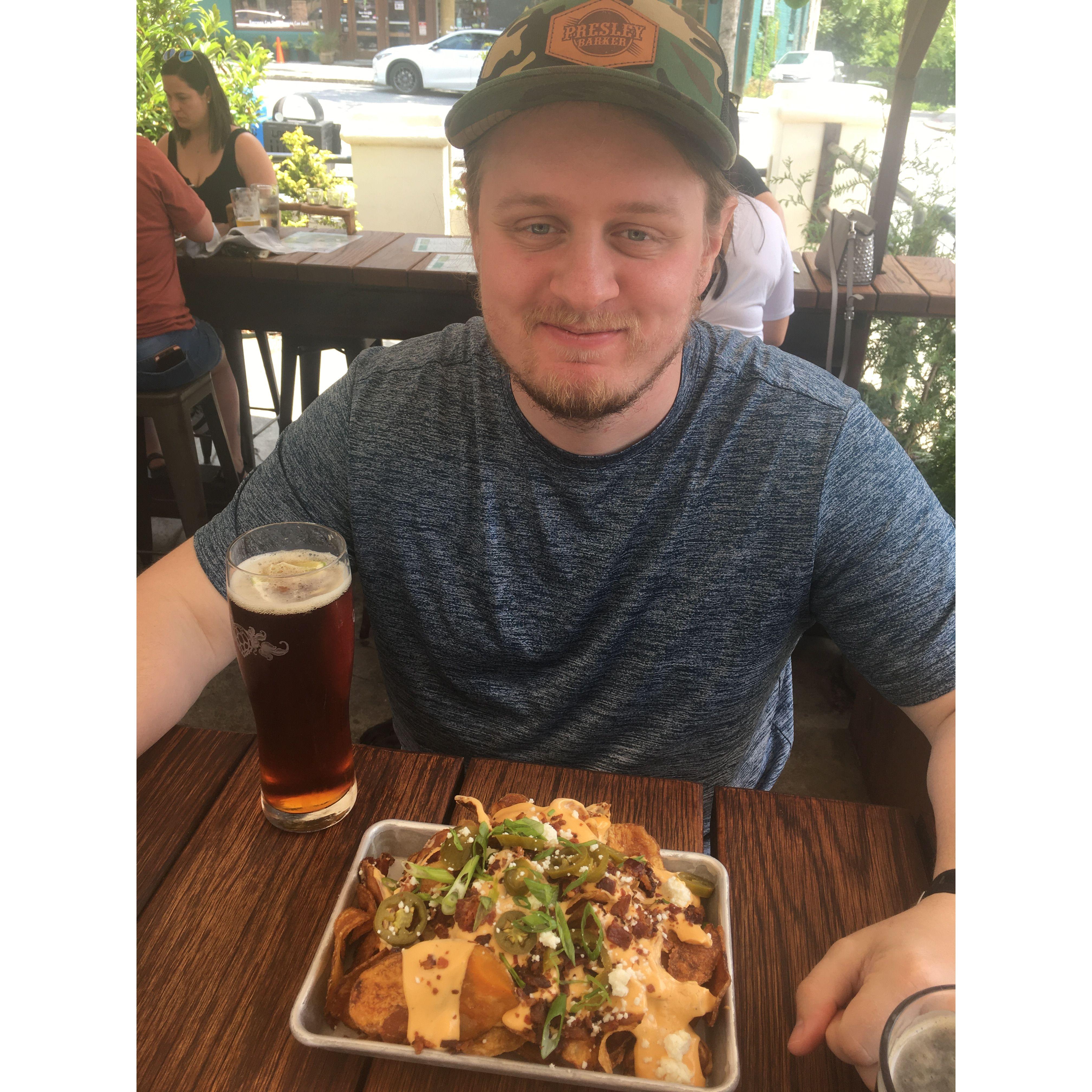 Quinton, and I at Wicked Weed in Ashville, pictured with our favorite (Beer & Loaded Fries).