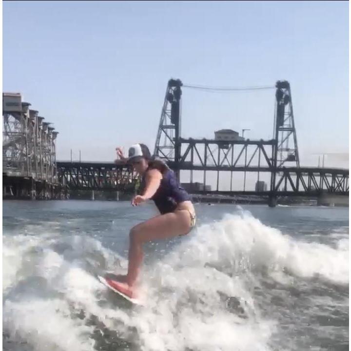 Anna wake-surfing in Downtown Portland, Oregon.