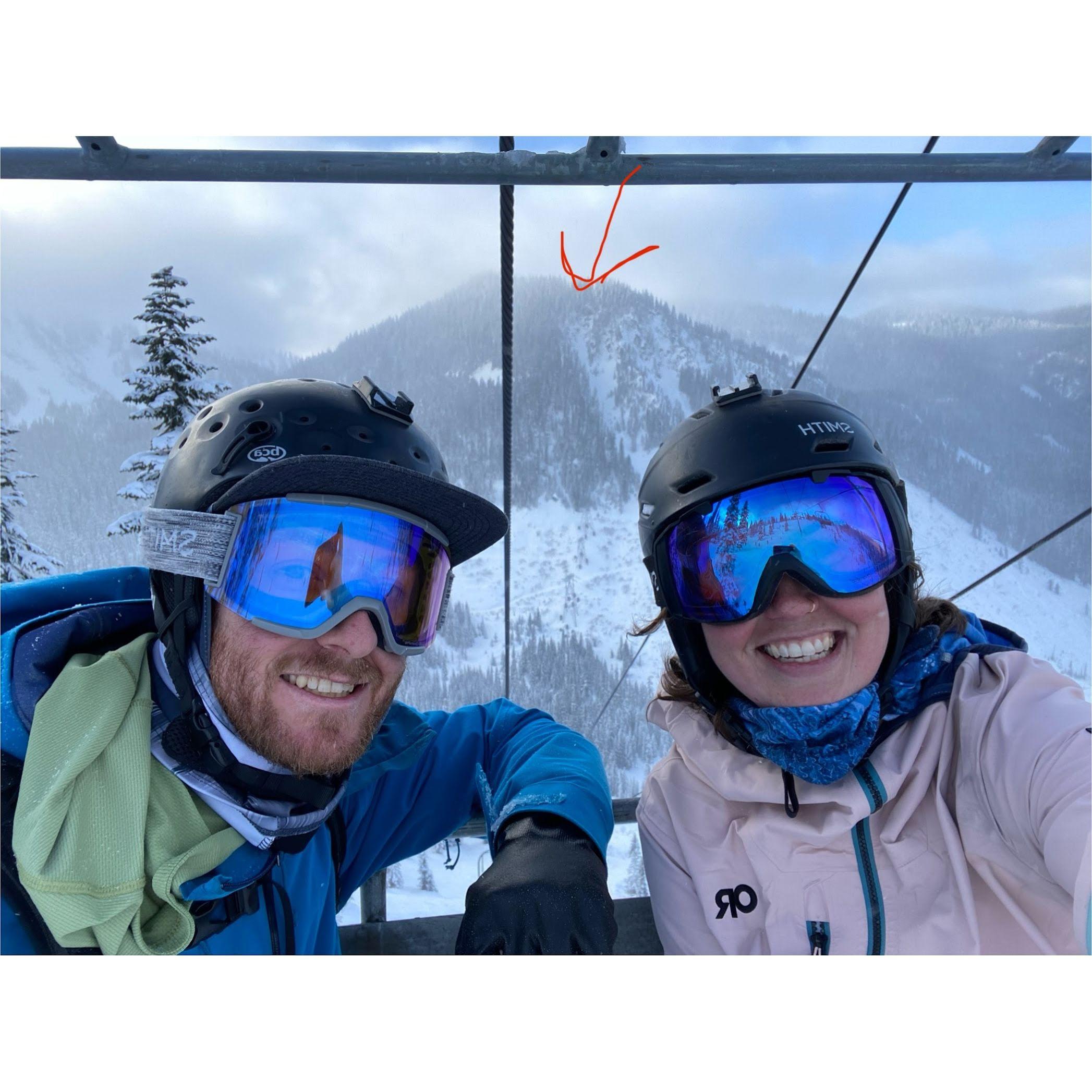 We got so stoked by the parting clouds and our news that we climbed up and skied Fleur de Lis (arrow in red)!
