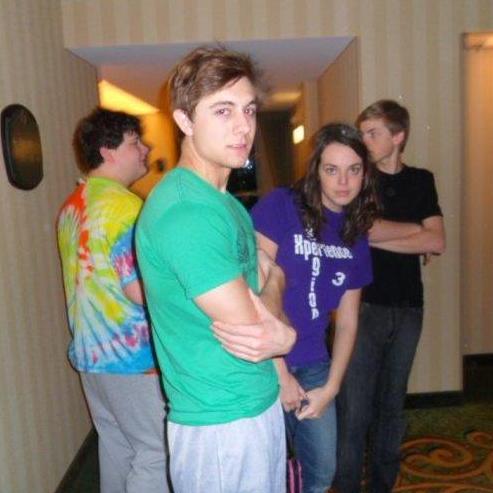 We're just as weird as we ever were, and the two guys in the background are still by our side.