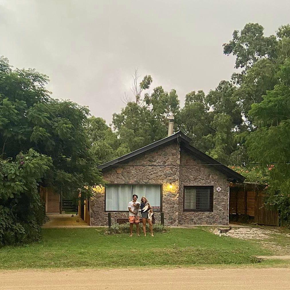 Our little family and our beach home in Playa Hermosa, Uruguay!