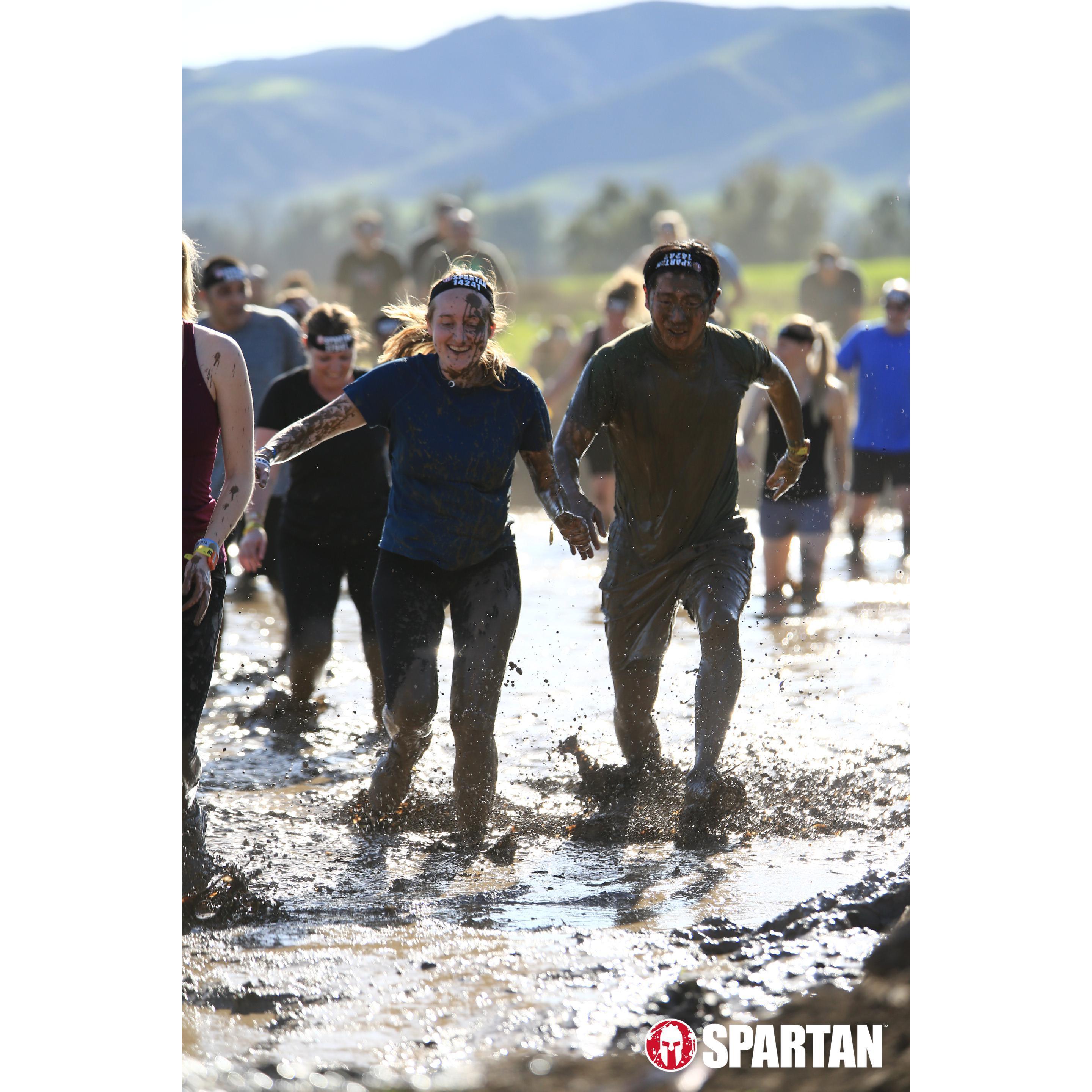 Gettin' nice & dirty in the Spartan Race.
Unsurprisingly Josh splashed Susie with mud & got it in her mouth.