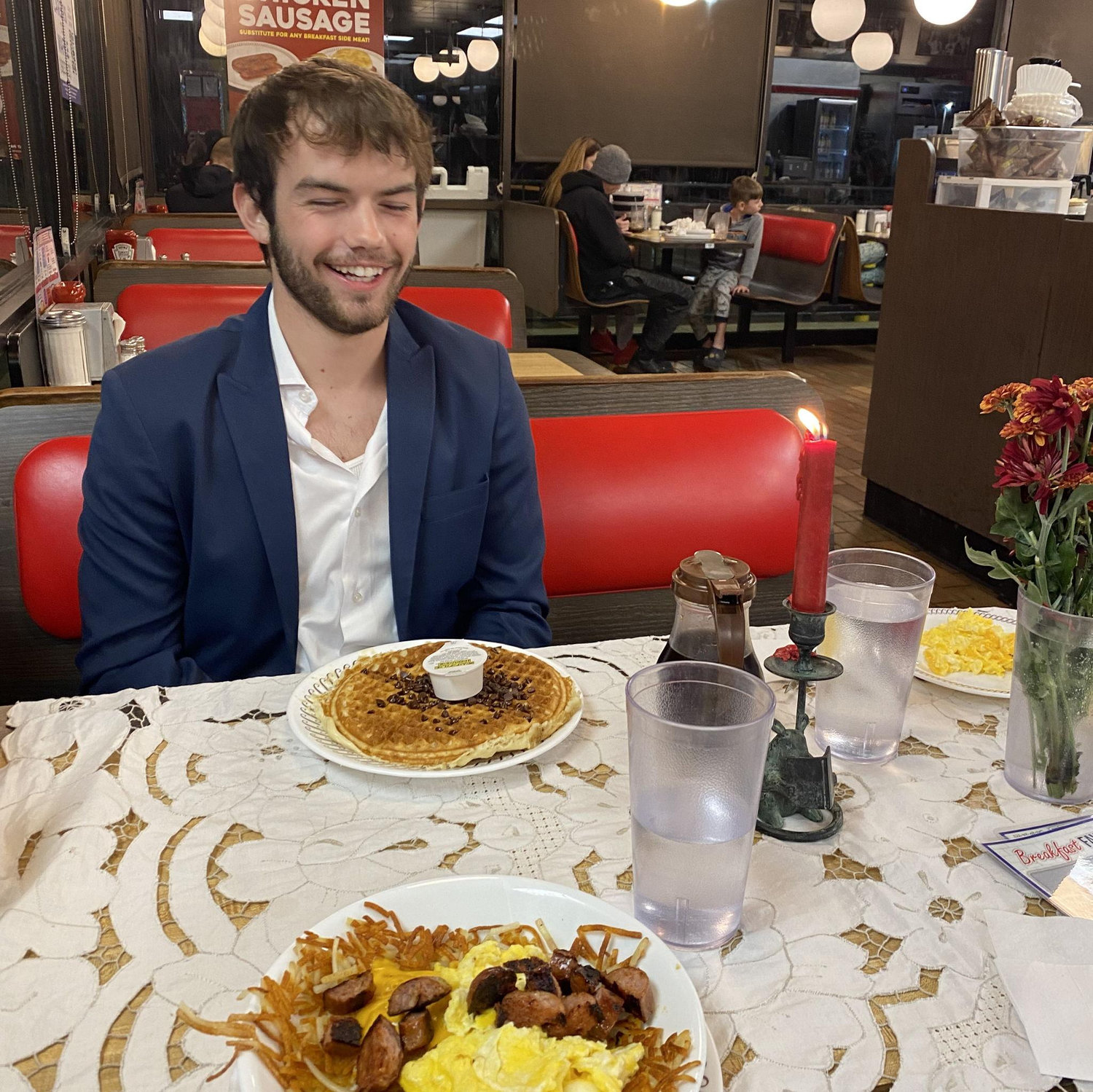 Our fourth date! Michael brought a tablecloth and flowers to Waffle House to make it fancy!