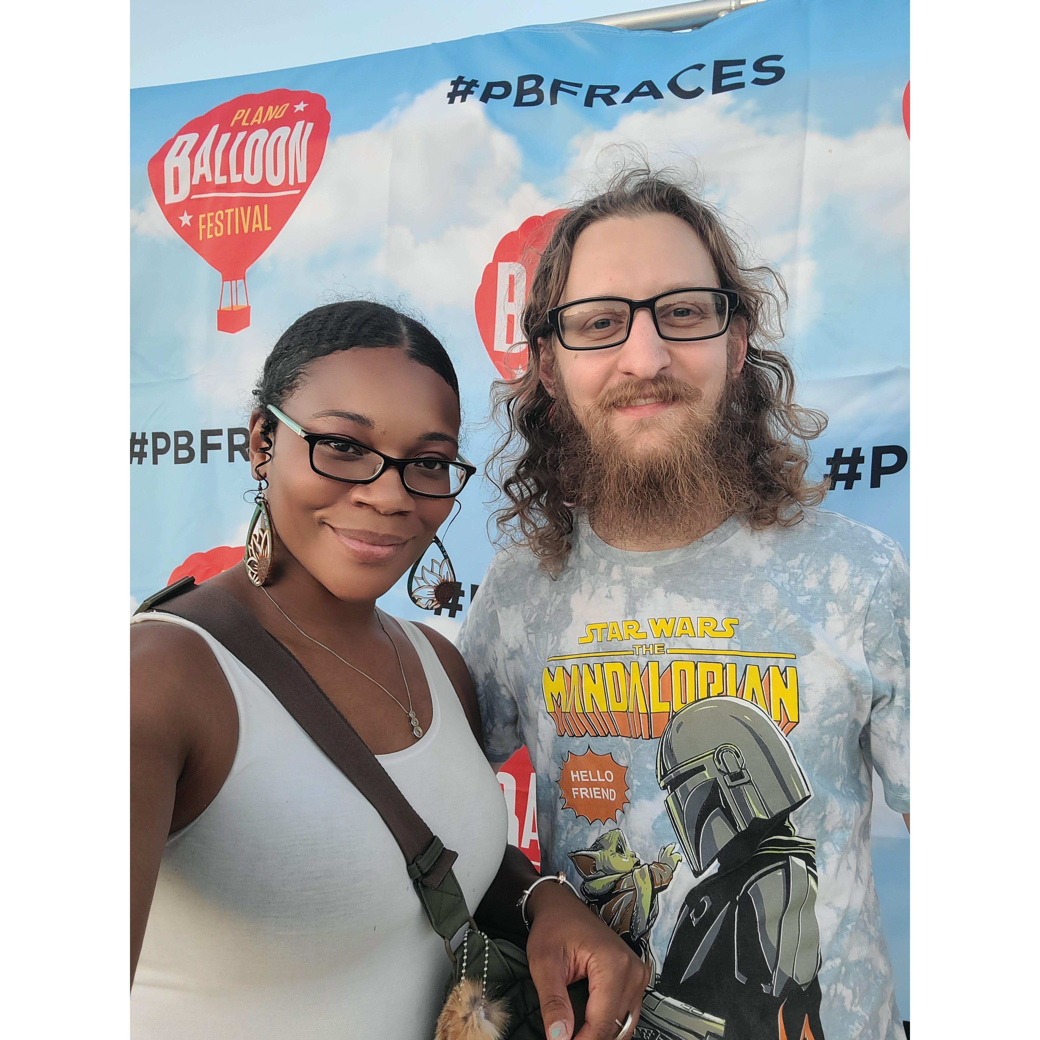 Plano Ballon Festival! Jonathan supporting me at my 2nd half-marathon. We came the day before to watch the ballons light up.