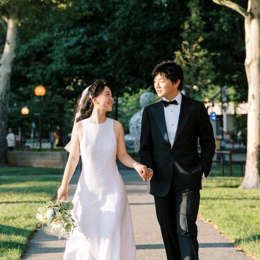 Walking near the lawn where we got engaged!