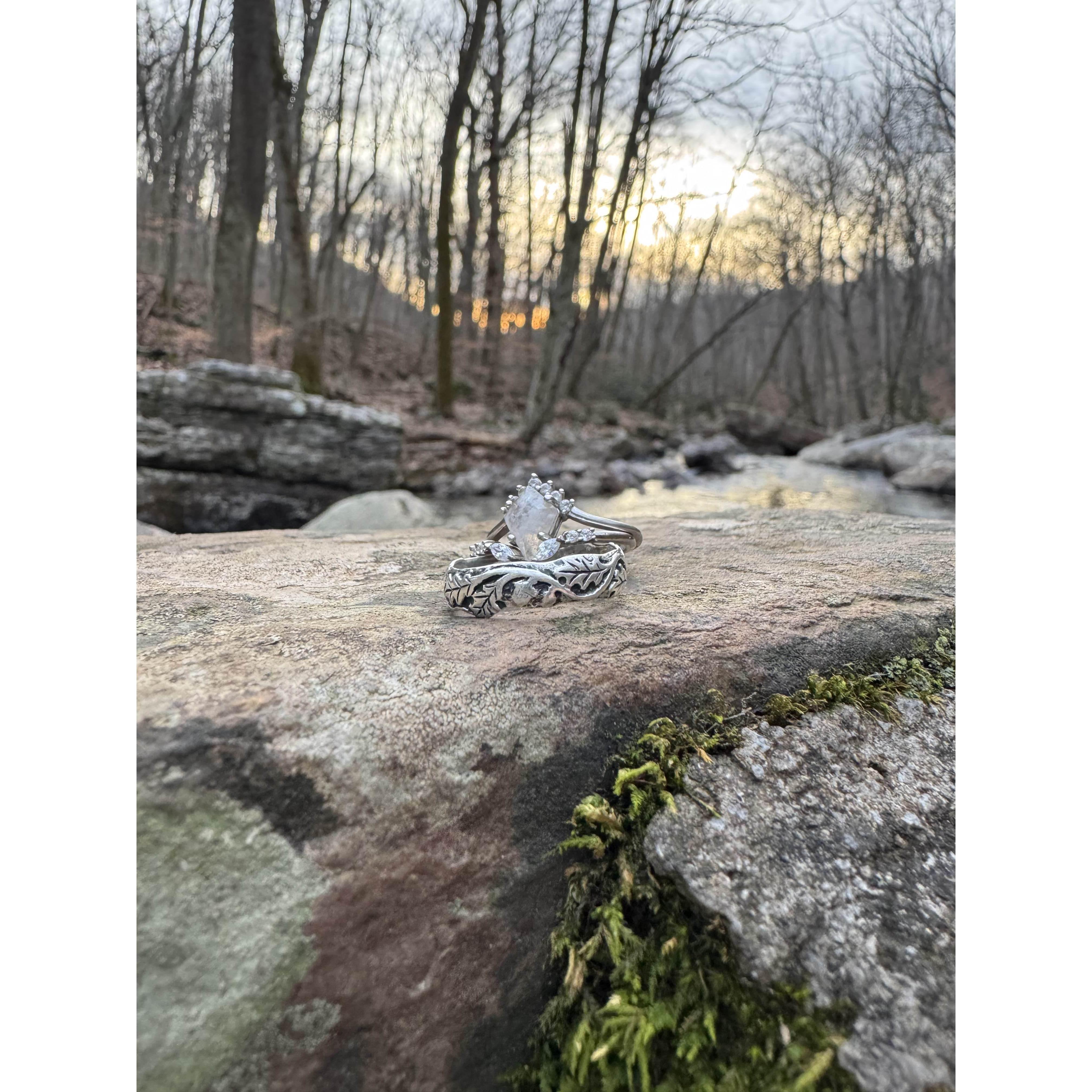 Our rings at our spot on Christmas for elopement!