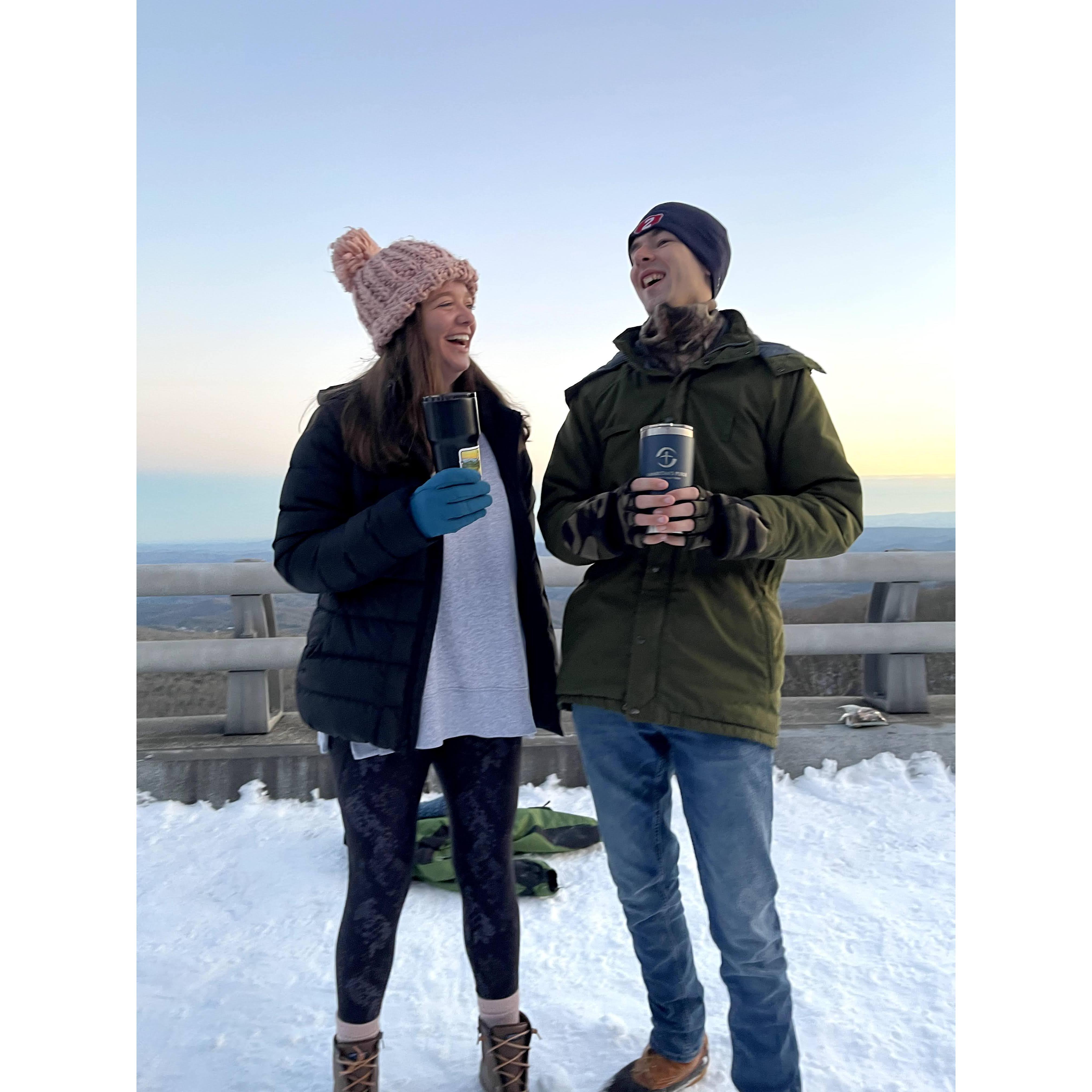 Always laughing and always have coffee in hand