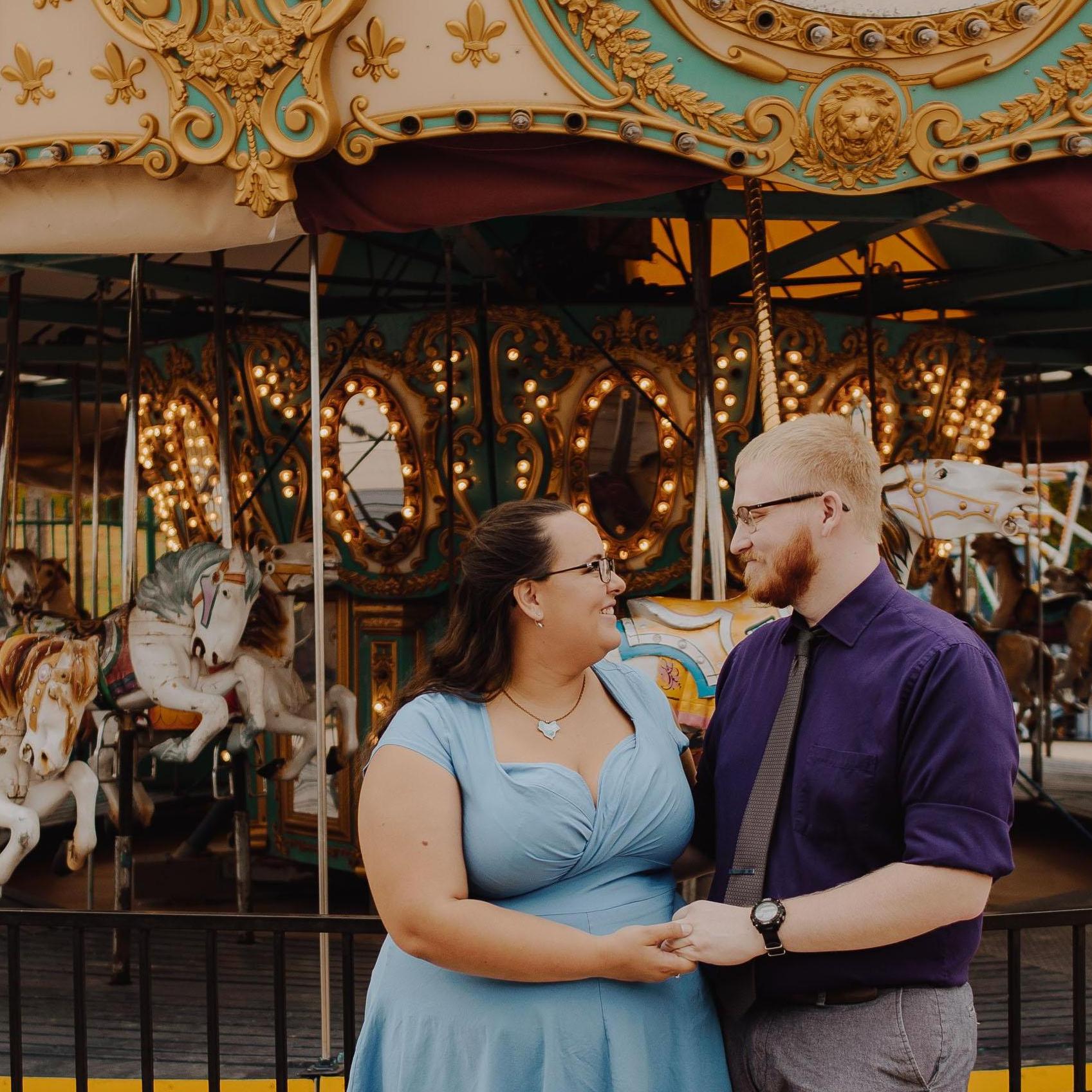 Our outfits in this photo match the wedding colors: light blue and deep, royal purple