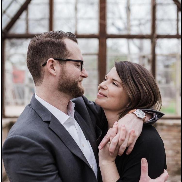 A special moment while getting our engagement photos taken at Sekrit Theater in Austin