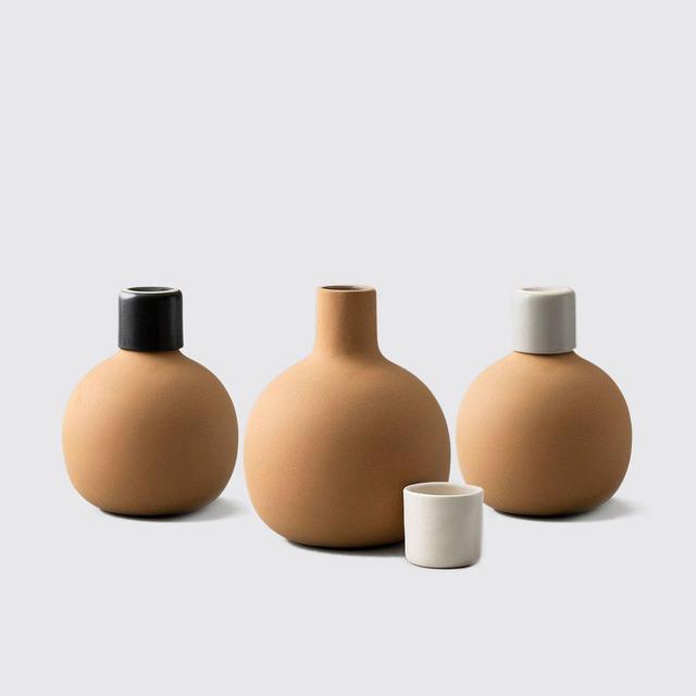 CONTAINER AND TUMBLER