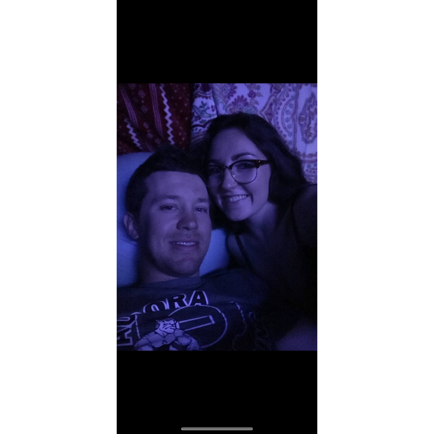 date night at home, we built a fort and put the TV in our fort to watch a movie