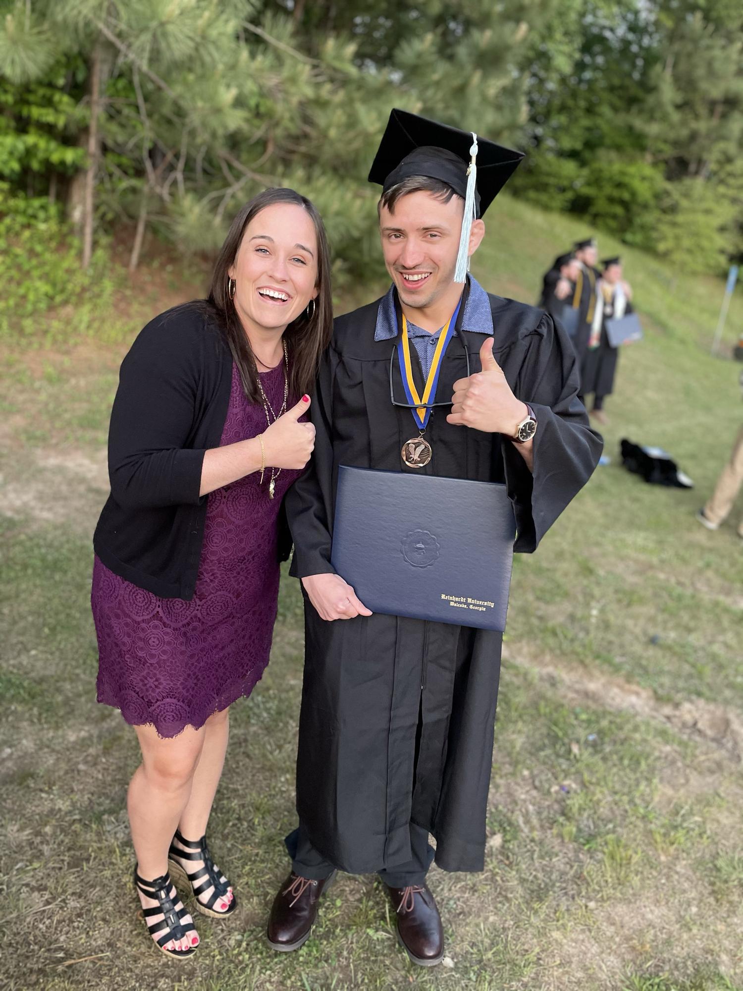 He did it! Post-COVID graduation ceremony.