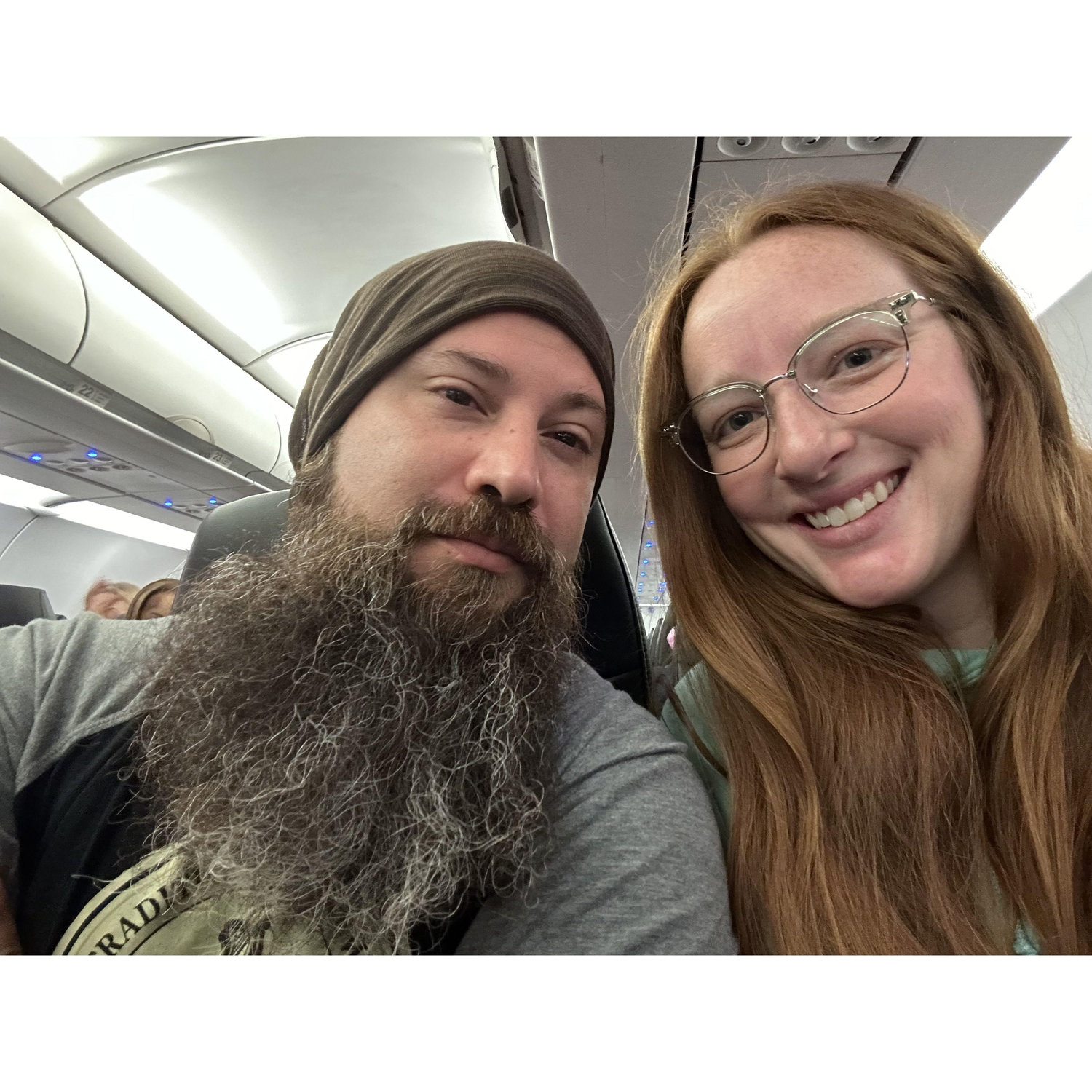Hayley forcing Will to take early-morning selfies in the plane on the way to Chicago, 2024. Will's first Chicago trip!