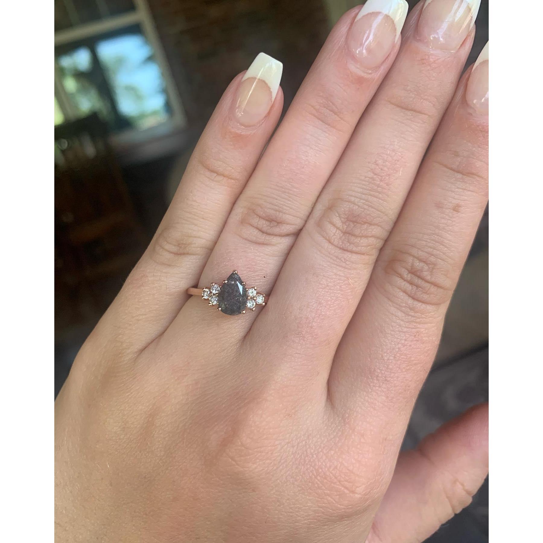 Syd loves all things classic & artsy. Taran chose a salt & pepper diamond. Once, a gem to be discarded now envied for its individuality. The side stones are from Taran's, late great-grandma's ring.
